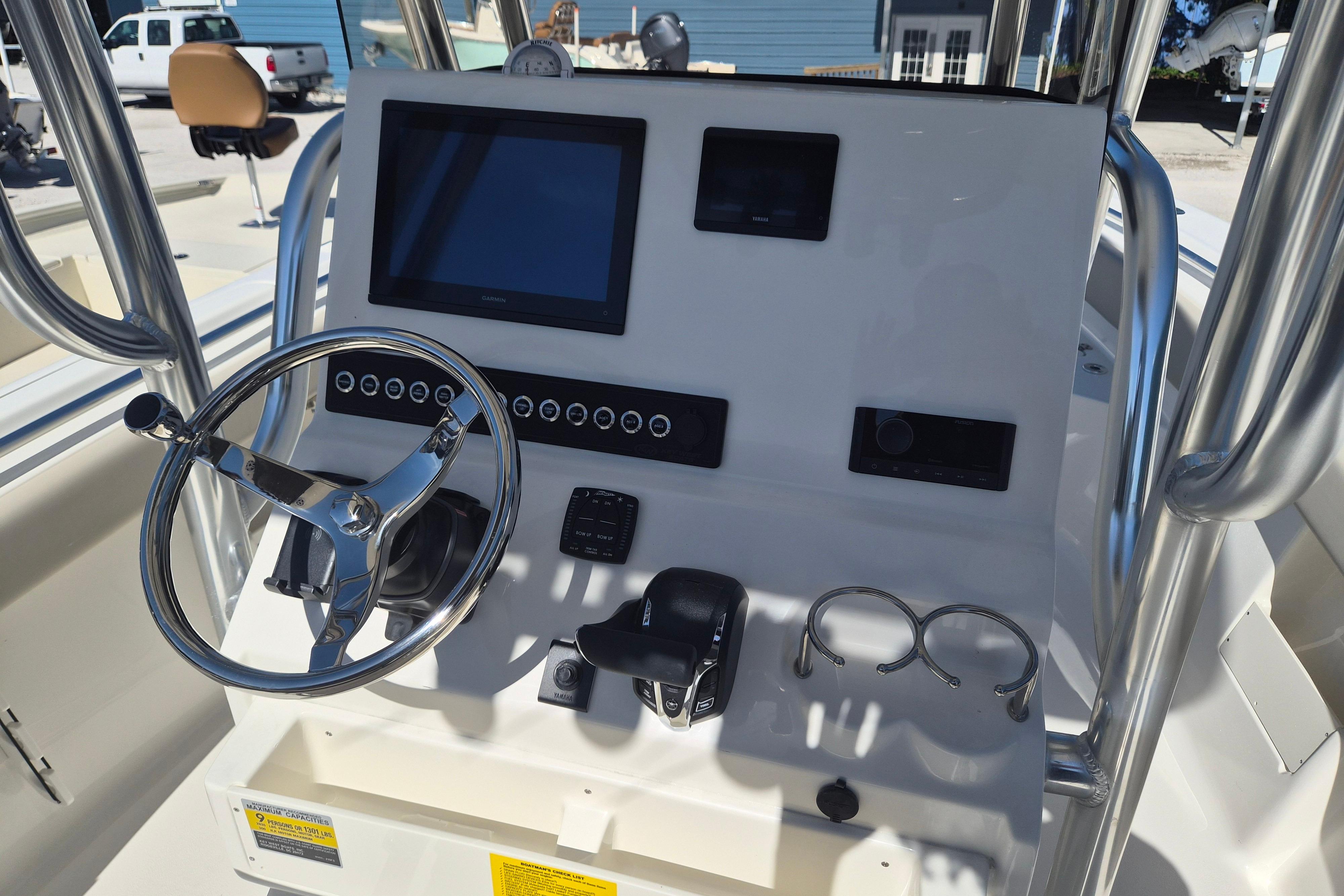 Steering console of 2026 Key West 239 FS boat with modern controls and display.