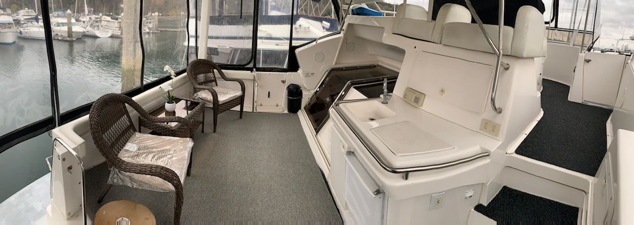 Interior of a 1998 Silverton 372/392 yacht with seating area.