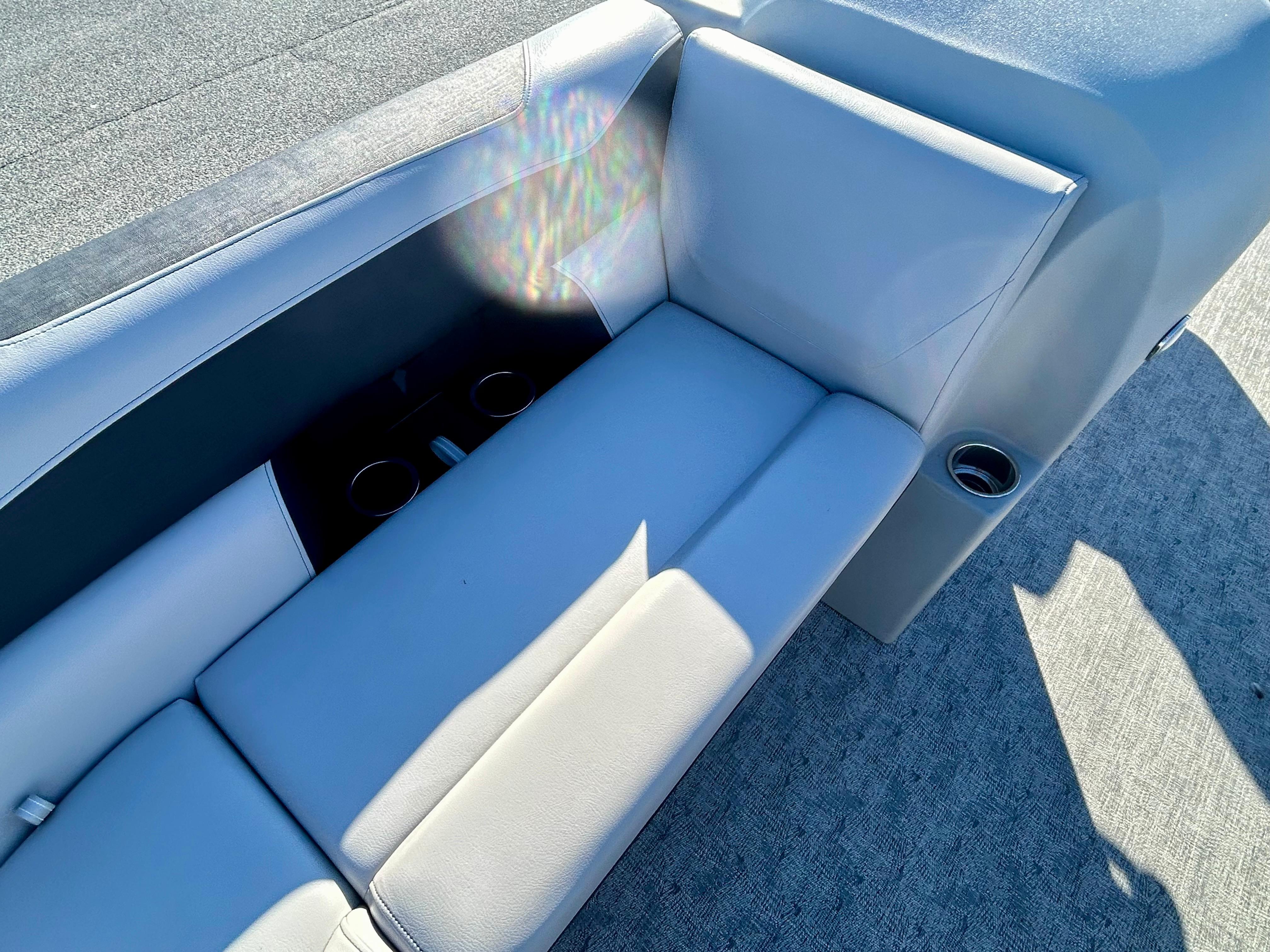 2024 Berkshire 24CL LE 2.75 boat interior with gray seating and cup holders.