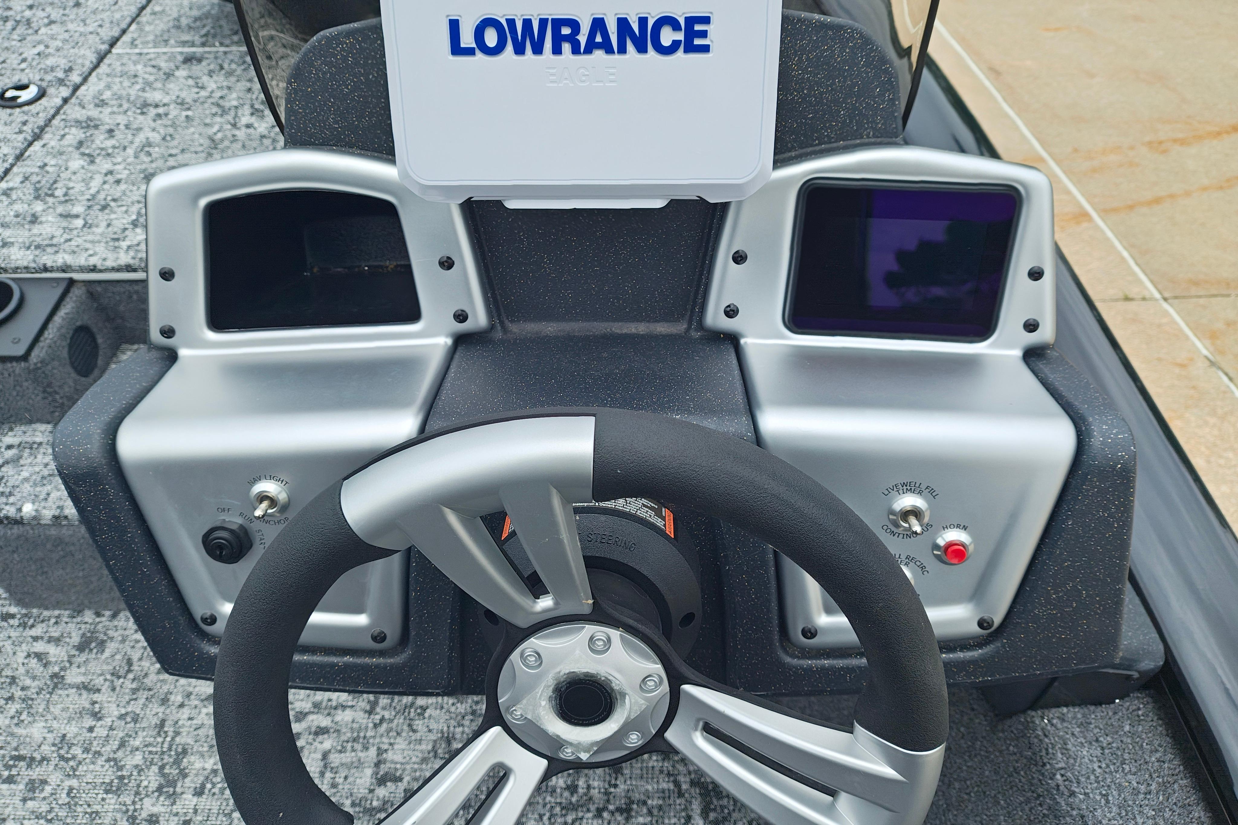 Steering console of 2026 Tracker Pro Team 175 boat with Lowrance electronics.