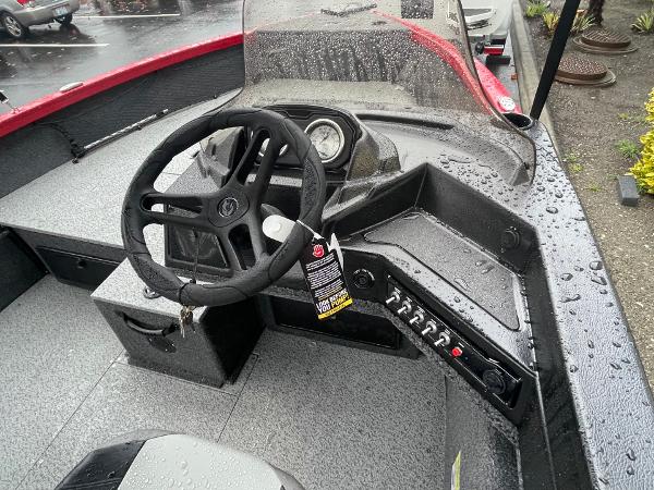 2021 Crestliner 1650 Fish Hawk SC boat interior with steering wheel and control panel.