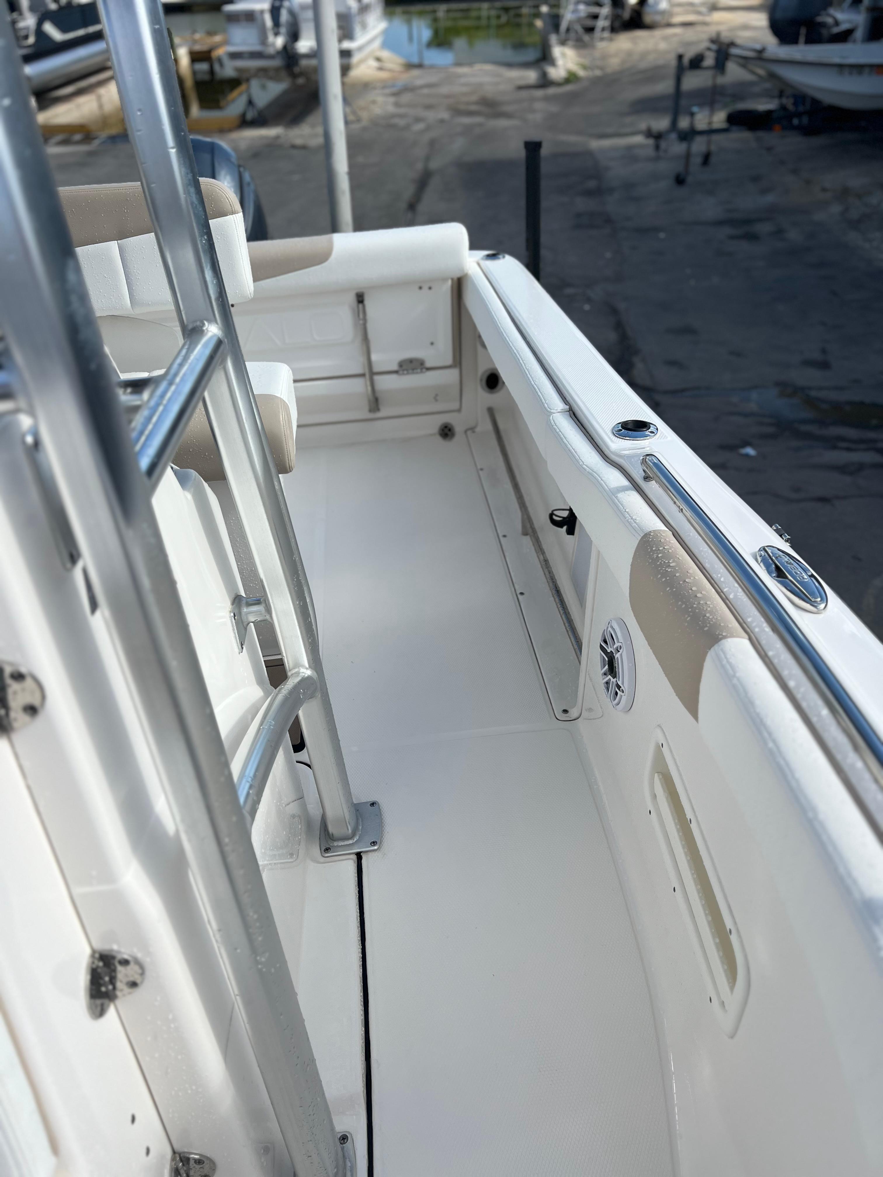 2022 Robalo R222 Center Console boat deck with stainless steel railings.