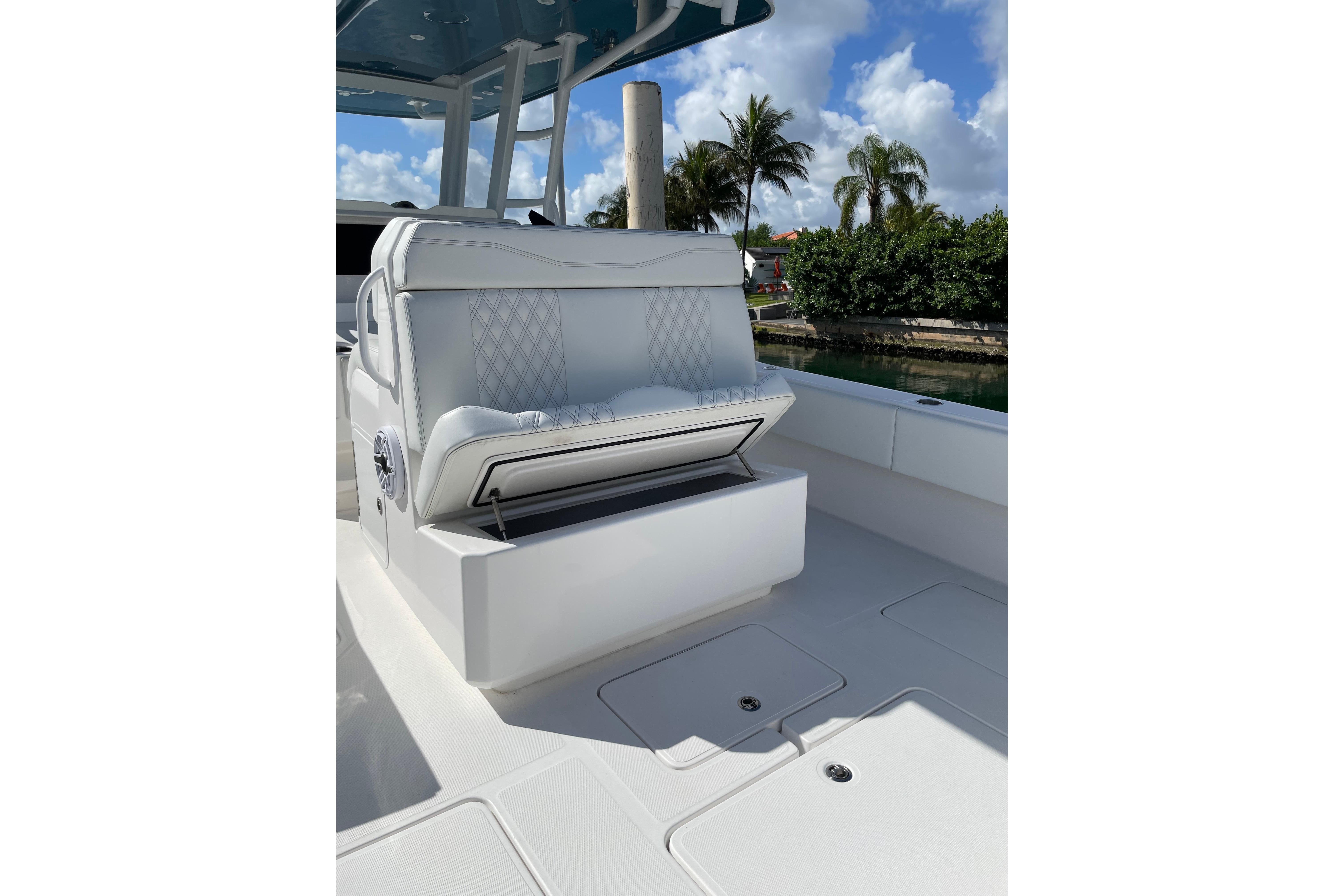 2024 Invincible 36 Open Fisherman boat interior with cushioned seating and storage.