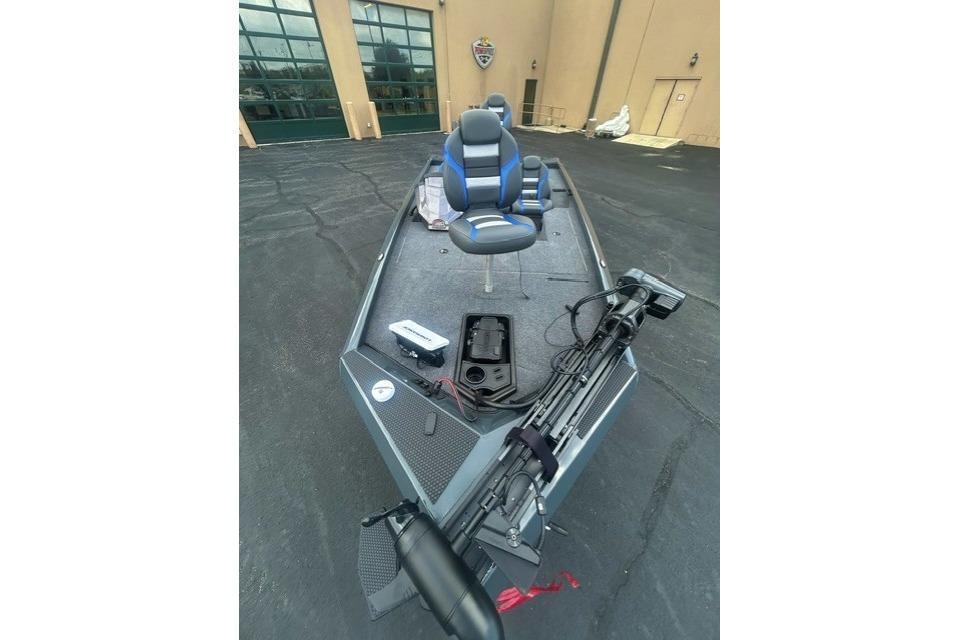 2026 Ranger RT178 fishing boat with blue seats and equipment on deck.