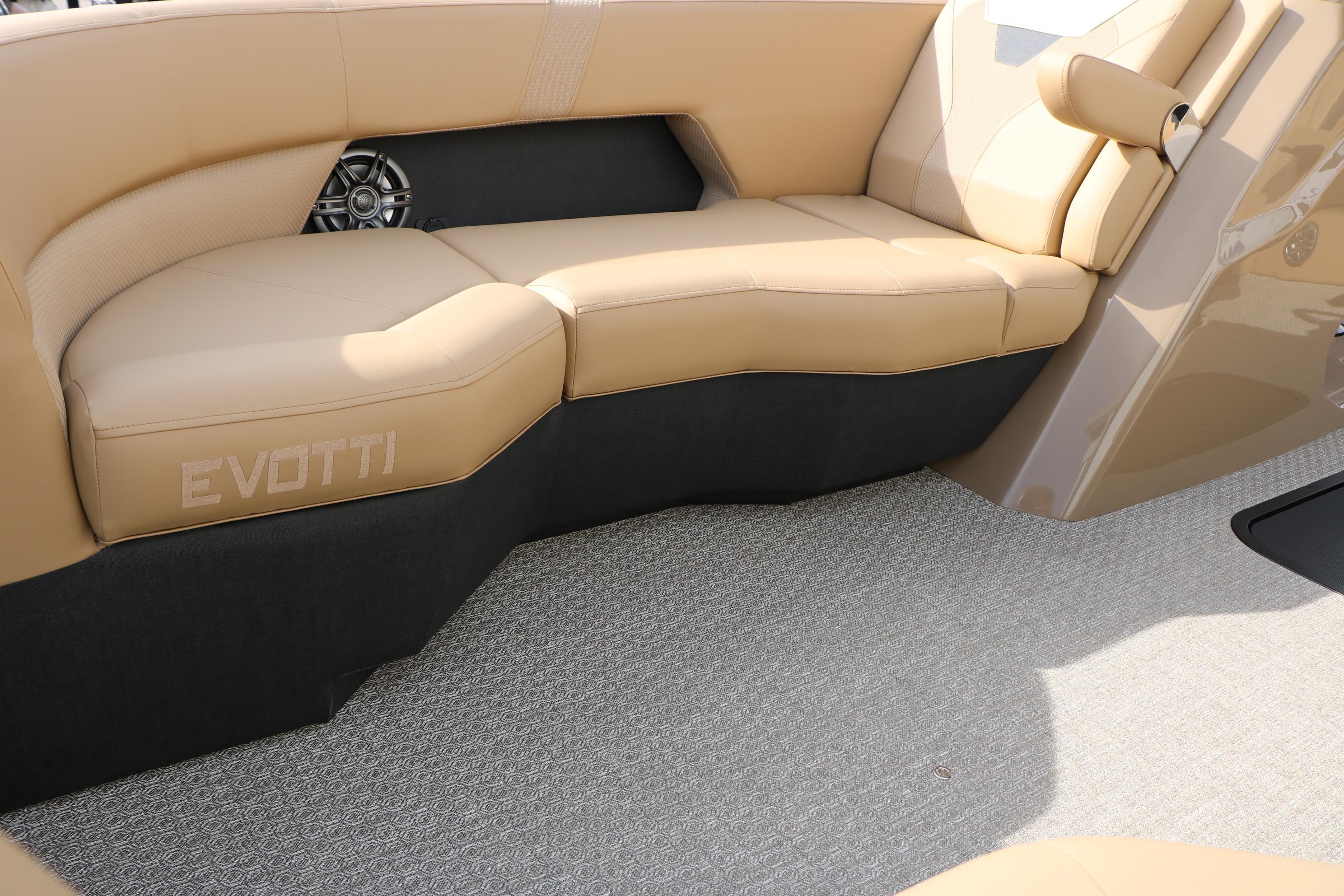 Luxurious Evotti 523CS 2026 boat interior with beige seating and modern design.