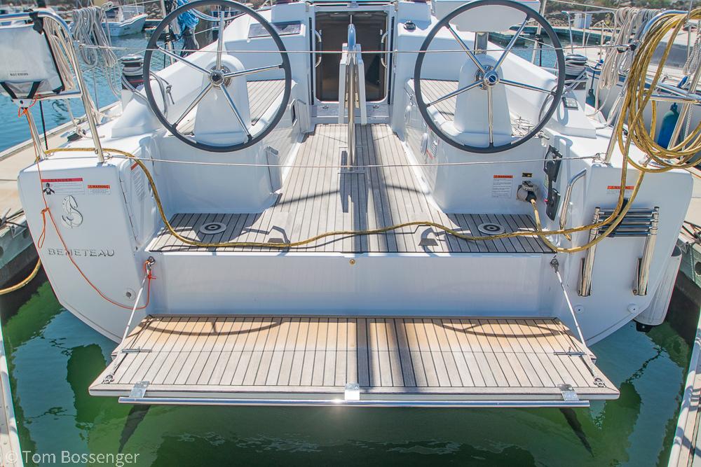 Beneteau Oceanis 30.1 yacht, 2022 model, featuring dual steering wheels and spacious deck.