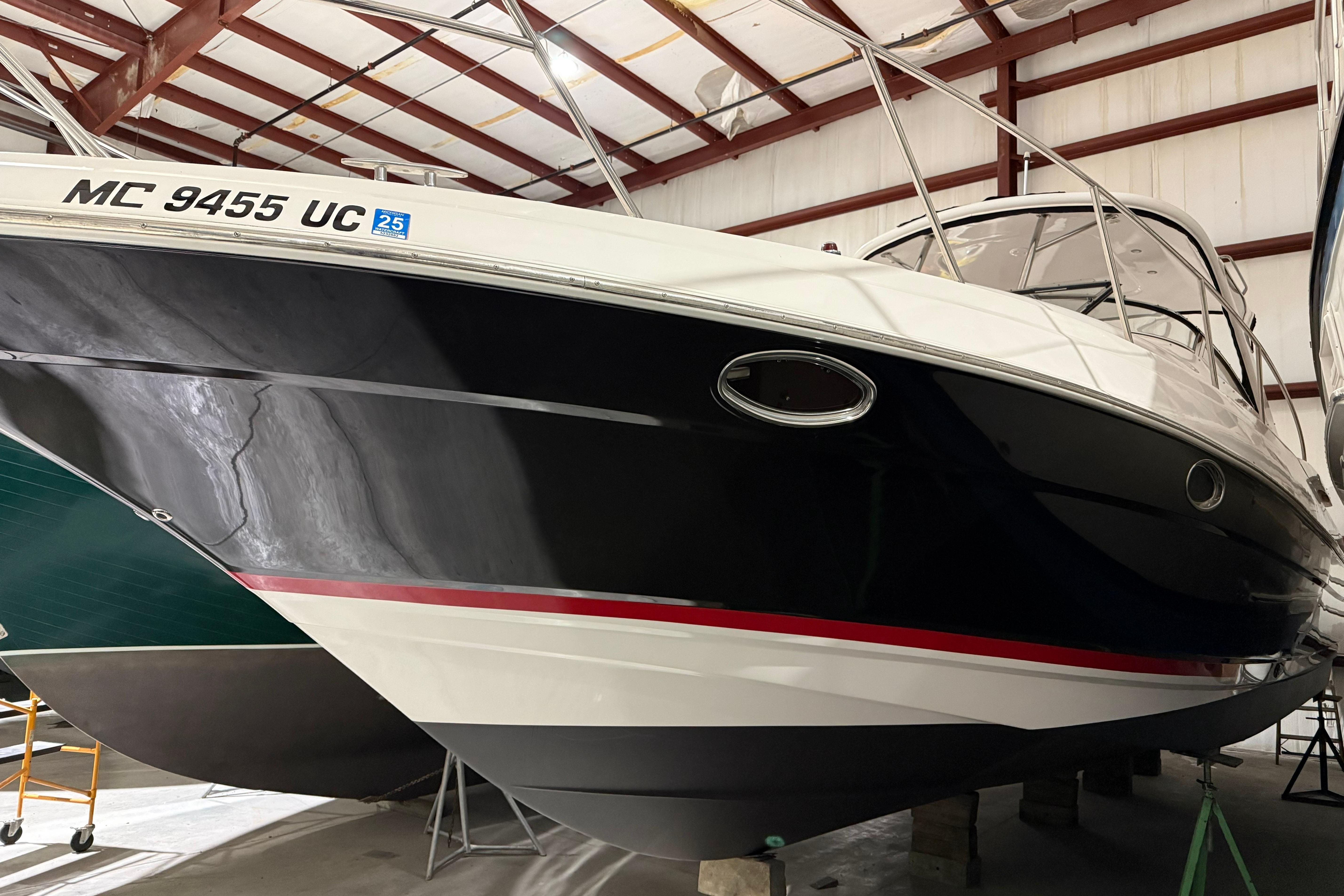 2007 Regal Commodore 3760 IO boat in storage, side view.