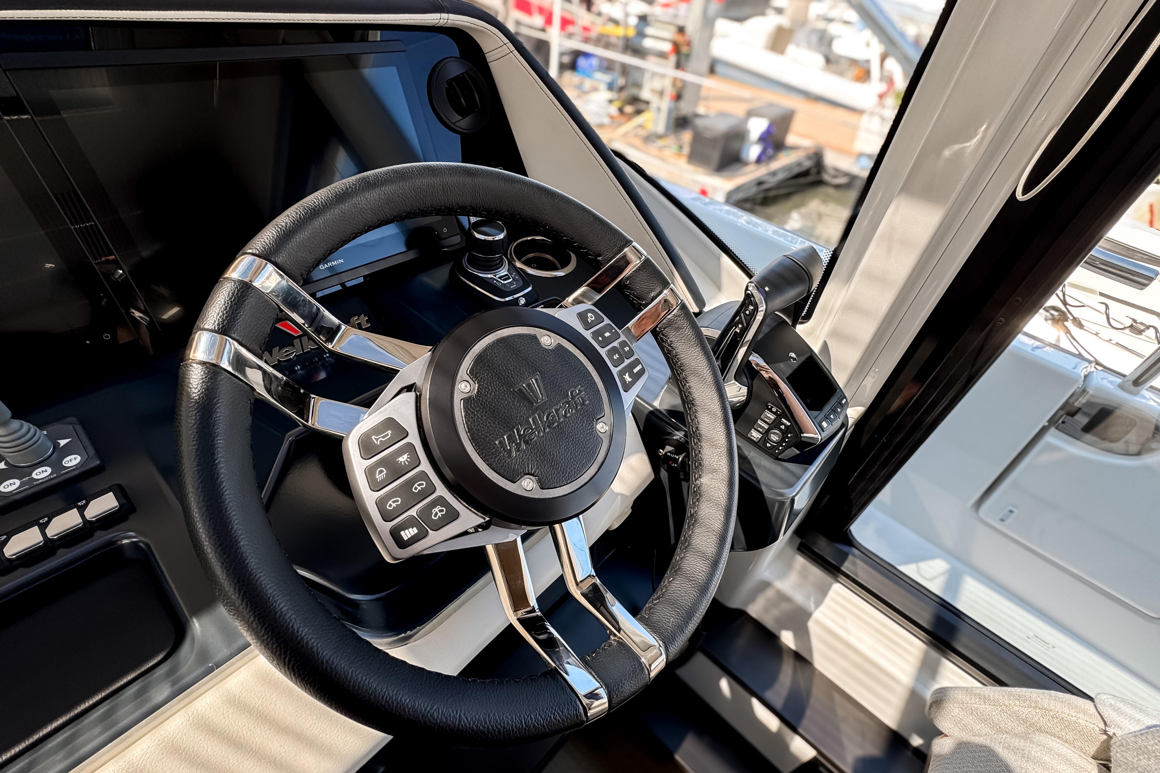 Wellcraft 44 Explorer 2026 helm with modern steering wheel.