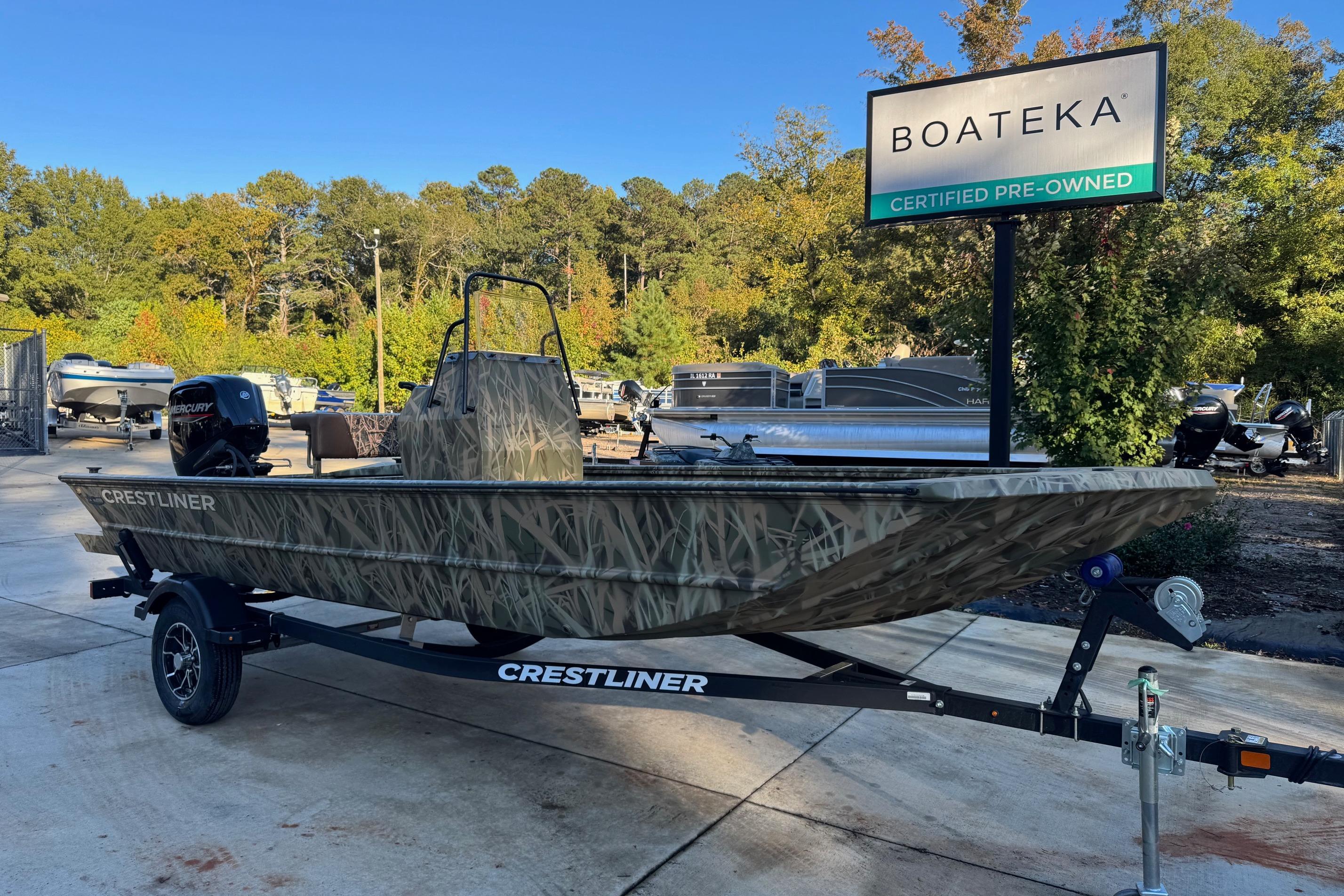 2026 Crestliner 1860 Retriever CC boat on trailer at Boateka, certified pre-owned.