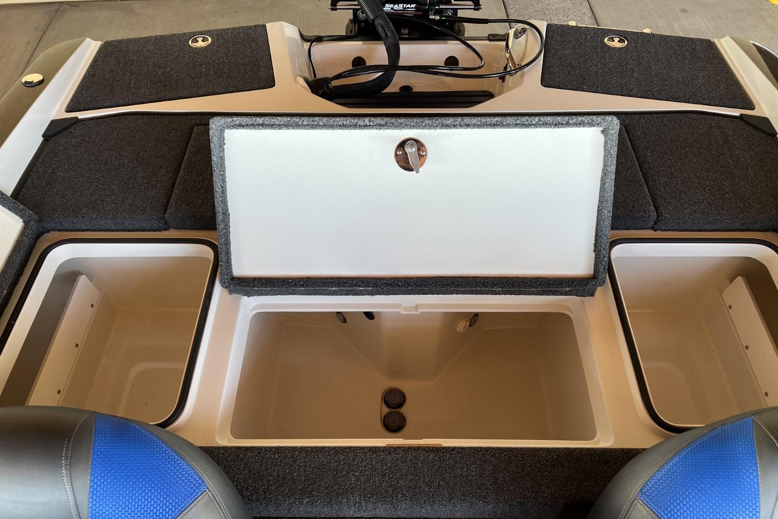 2025 Ranger 212LS boat interior storage compartments with open lids, showcasing spacious design.