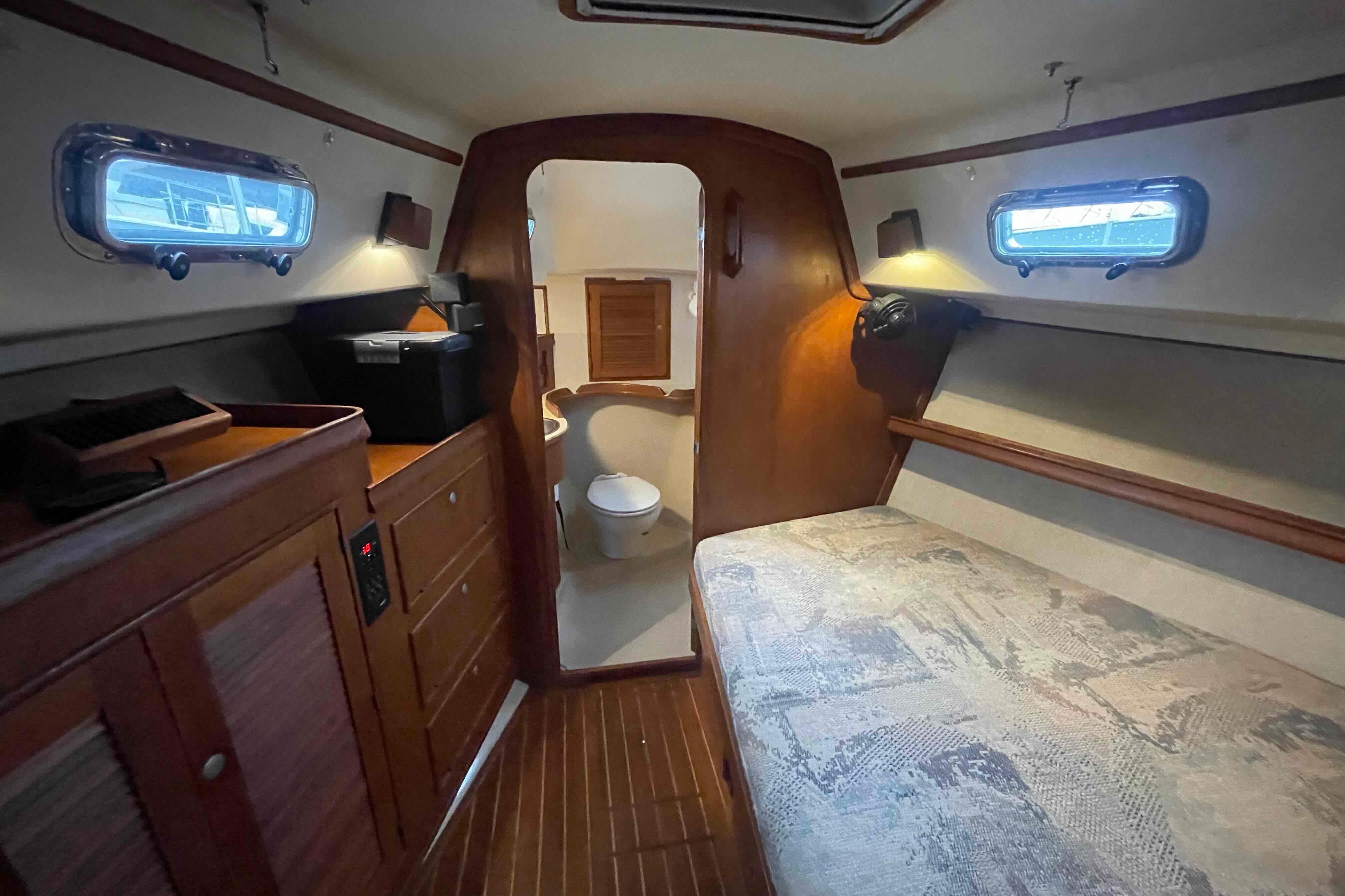 Interior of 1998 Island Packet 40 sailboat cabin with bed and bathroom.