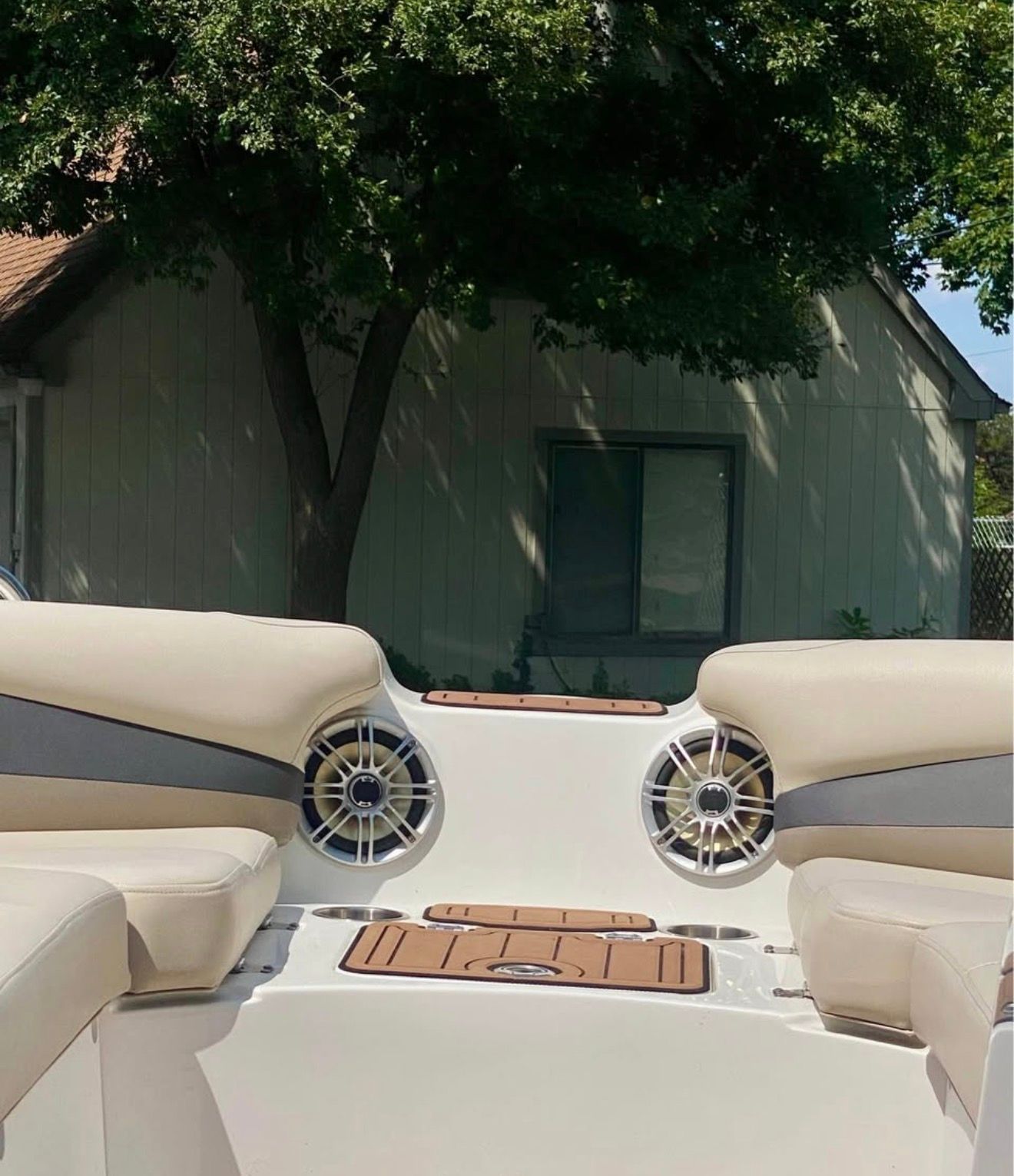 Interior of a 2017 Hurricane SS202 boat with speakers.