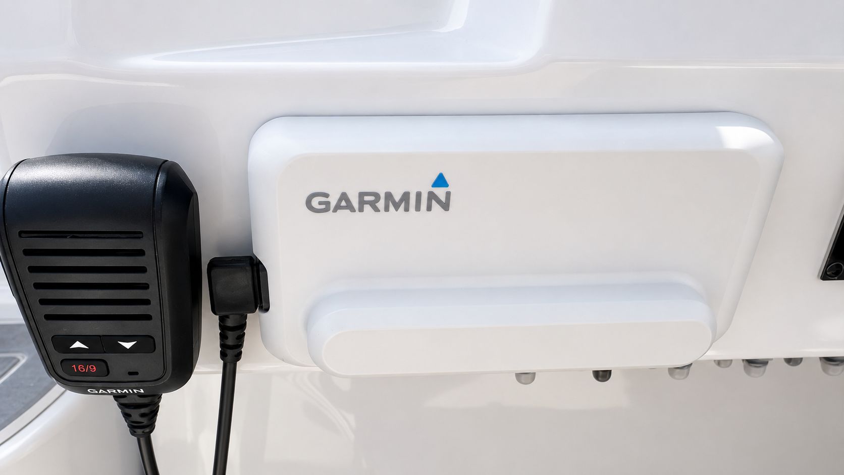 Close-up of a Garmin device on a 2020 Regal 28 Express boat.