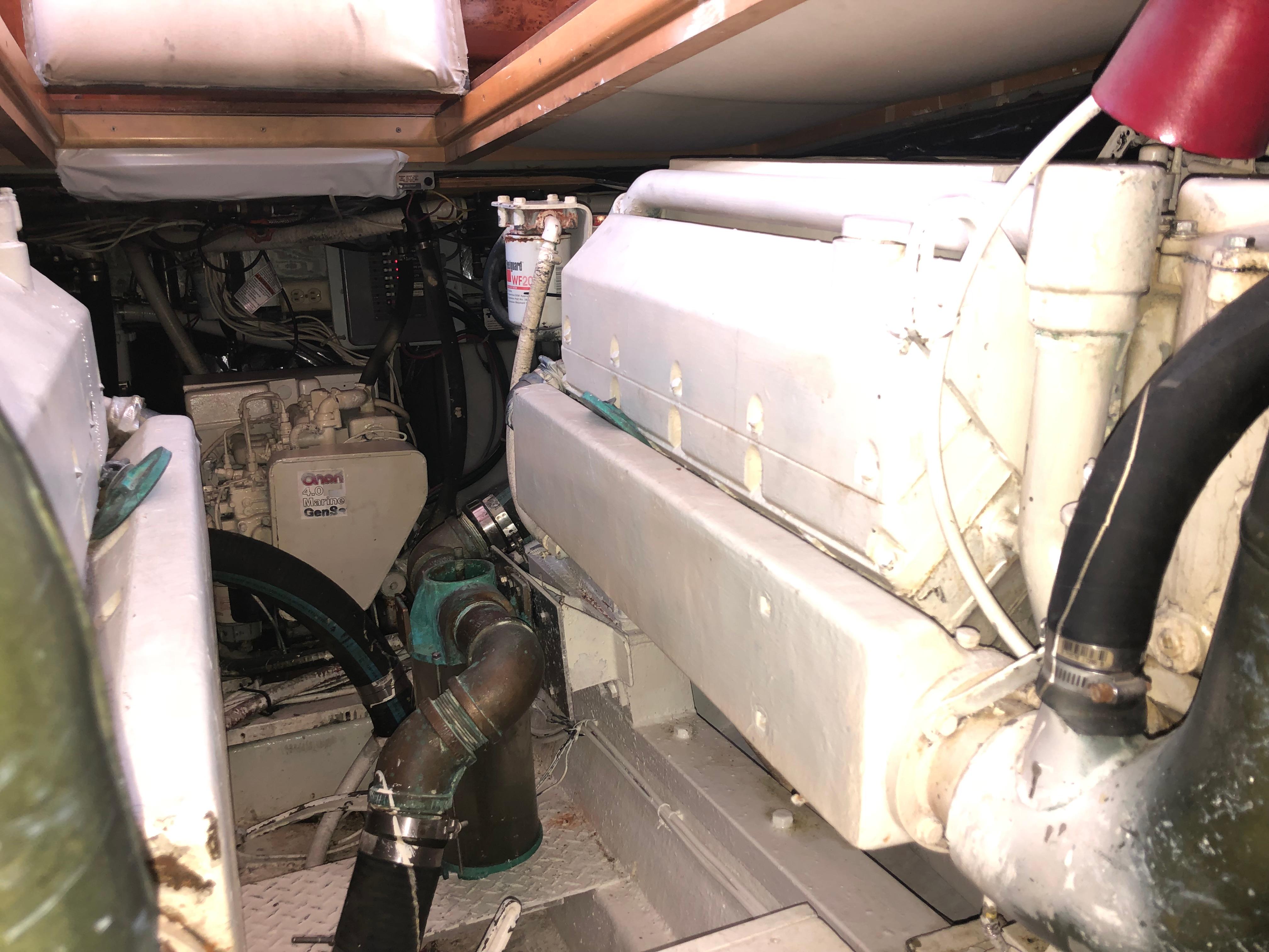 Engine room of 1971 Matthews Custom Pilothouse Motor Yacht, showcasing mechanical components.
