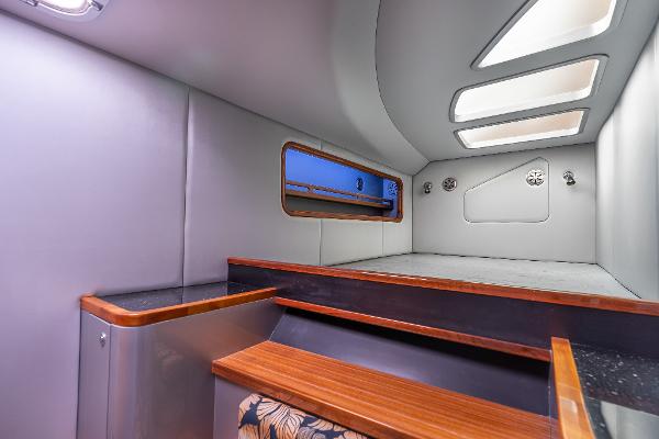 Interior of 2025 Shuttleworth 52 AeroRig yacht, featuring modern design and wooden accents.