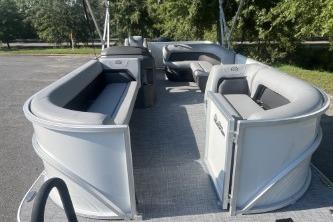 2026 Sun Tracker Party Barge 18 DLX pontoon boat with spacious seating and sleek design.