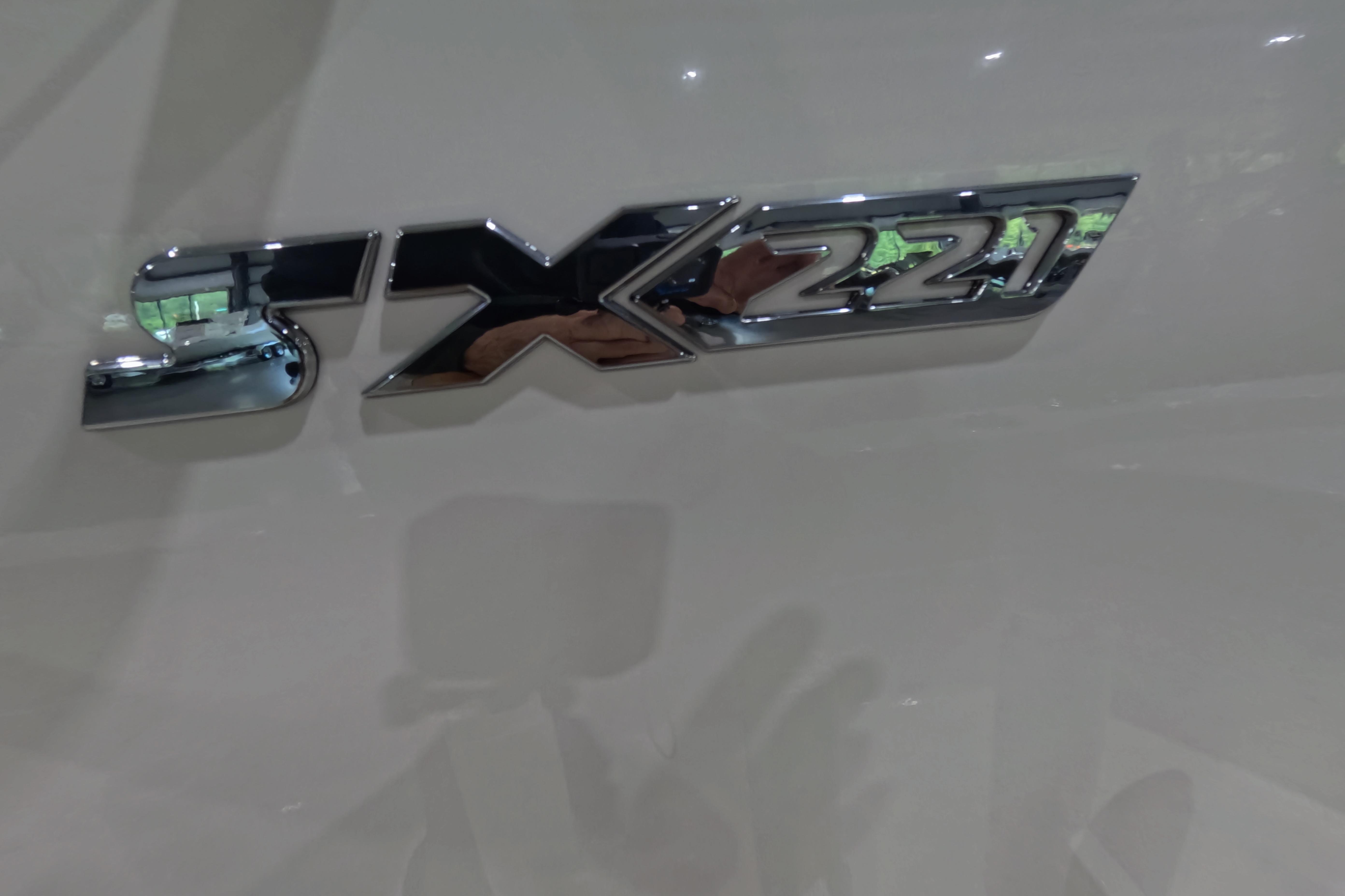 Chrome "SX 221" emblem on 2026 Skeeter boat.