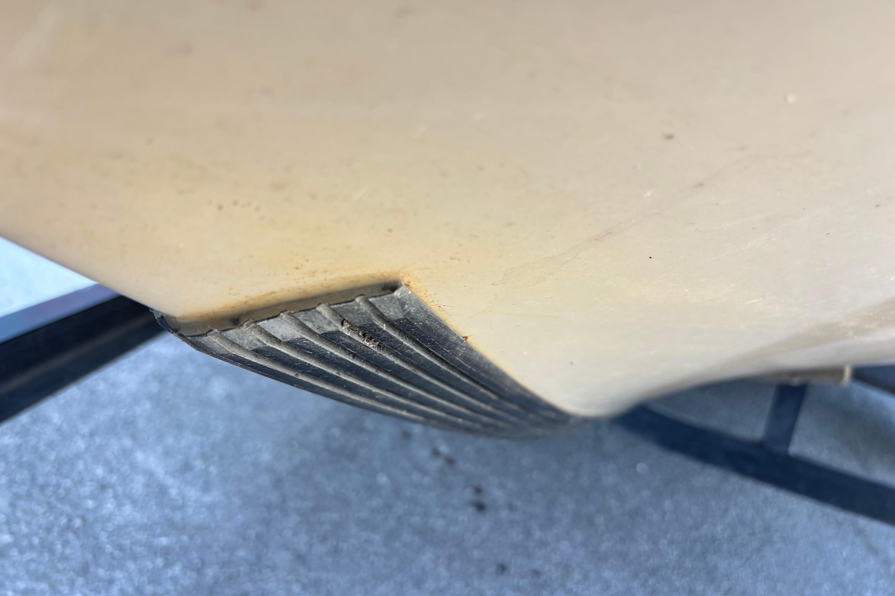 Close-up of a 2004 Ranger 175SVS boat hull detail on a trailer.
