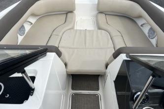 2017 Bayliner 195 Deck Boat interior with beige seating and modern design.