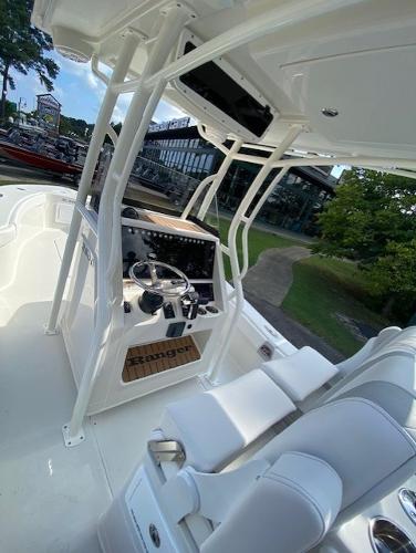 2024 Ranger 2600 Bay boat interior with steering console and seating.
