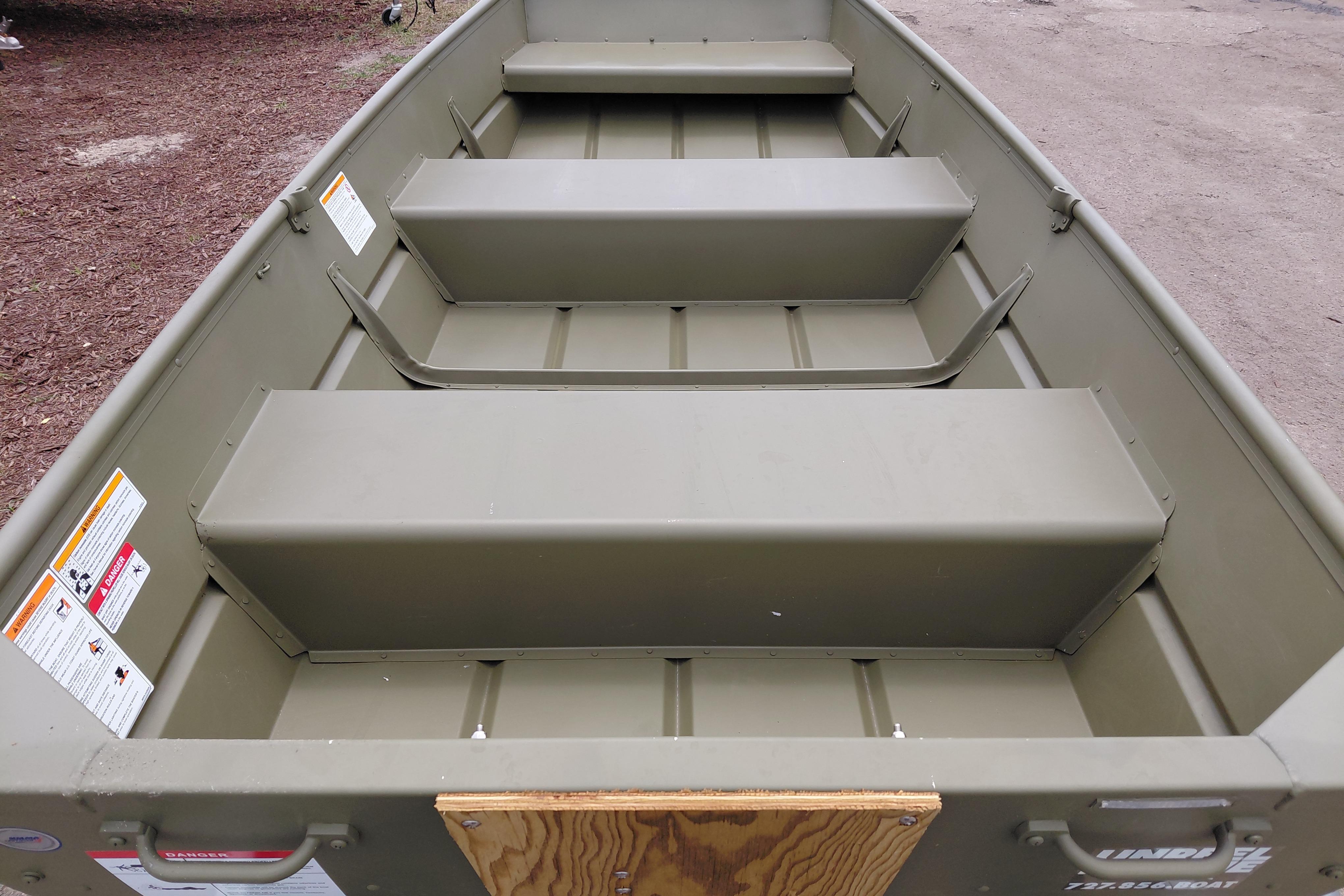 2025 Lowe L1040 Jon boat interior with bench seats, showcasing durable design and spacious layout.