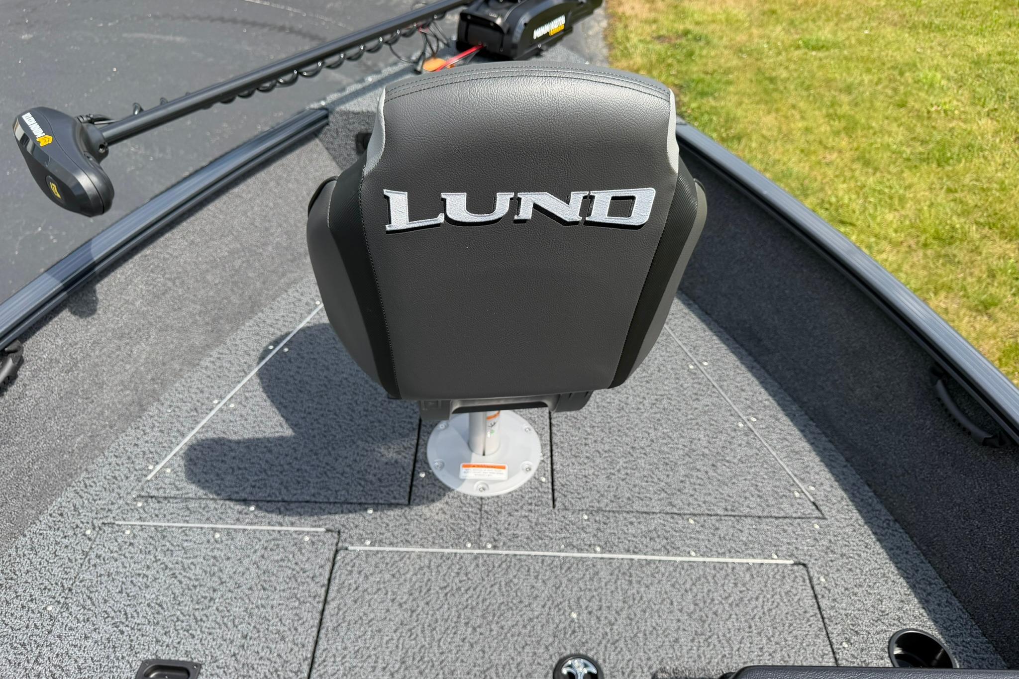 2027 Lund 1650 Rebel XL SS boat seat with logo, gray deck, and trolling motor.