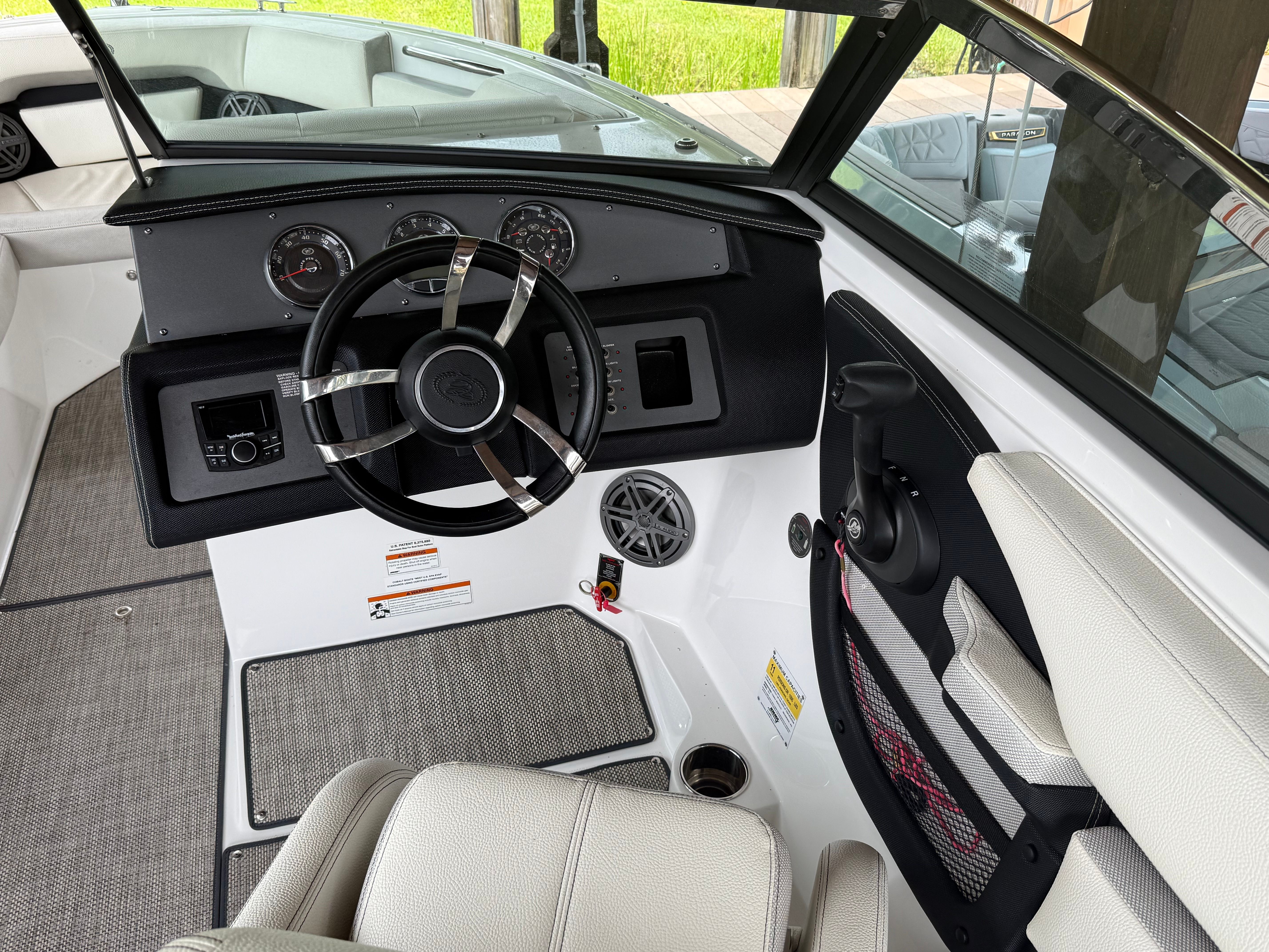 The cockpit of a Cobalt CS22 Bowrider with steering wheel and dashboard.