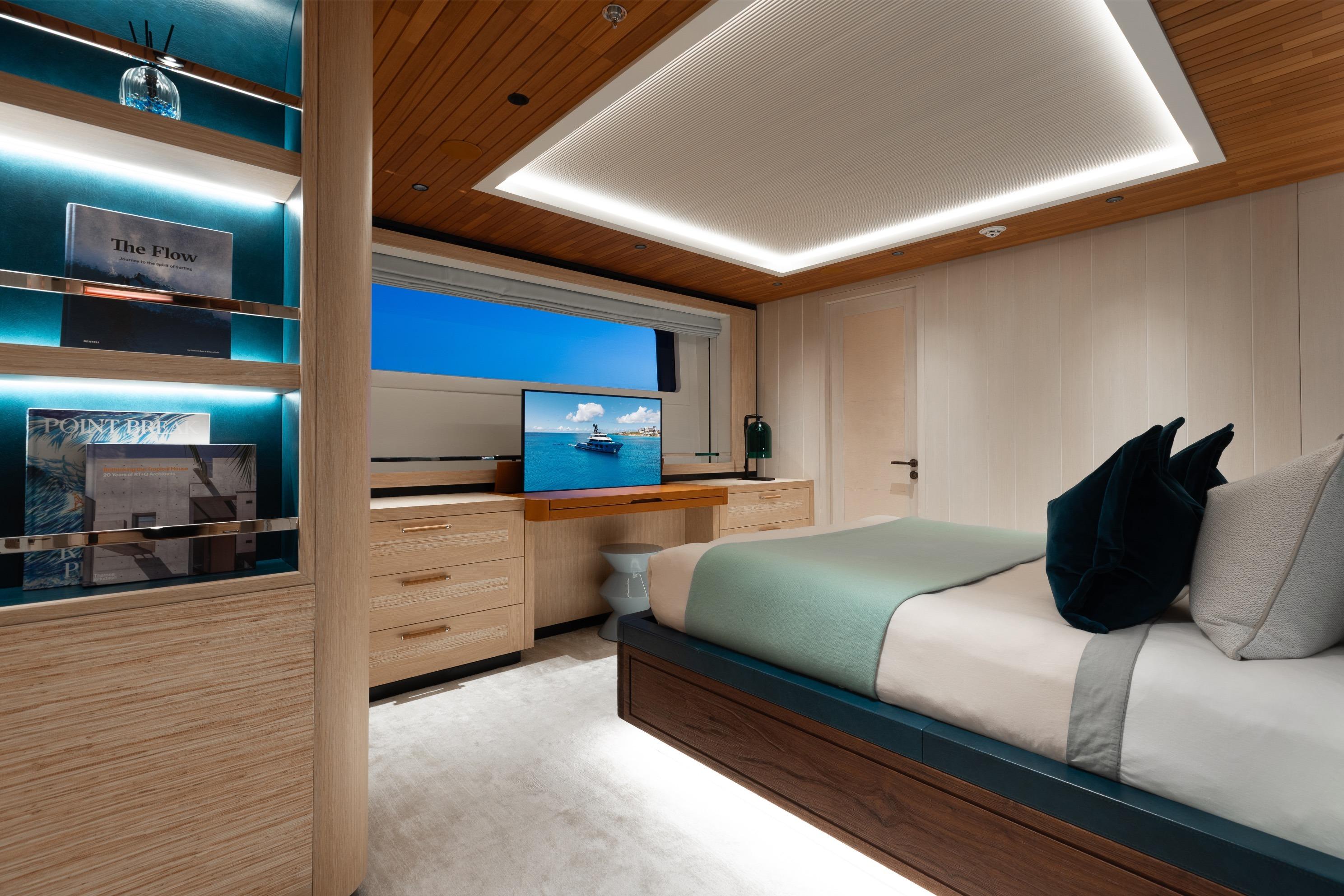 Luxurious 2024 Dunya Yachts Explorer bedroom with modern decor and ambient lighting.