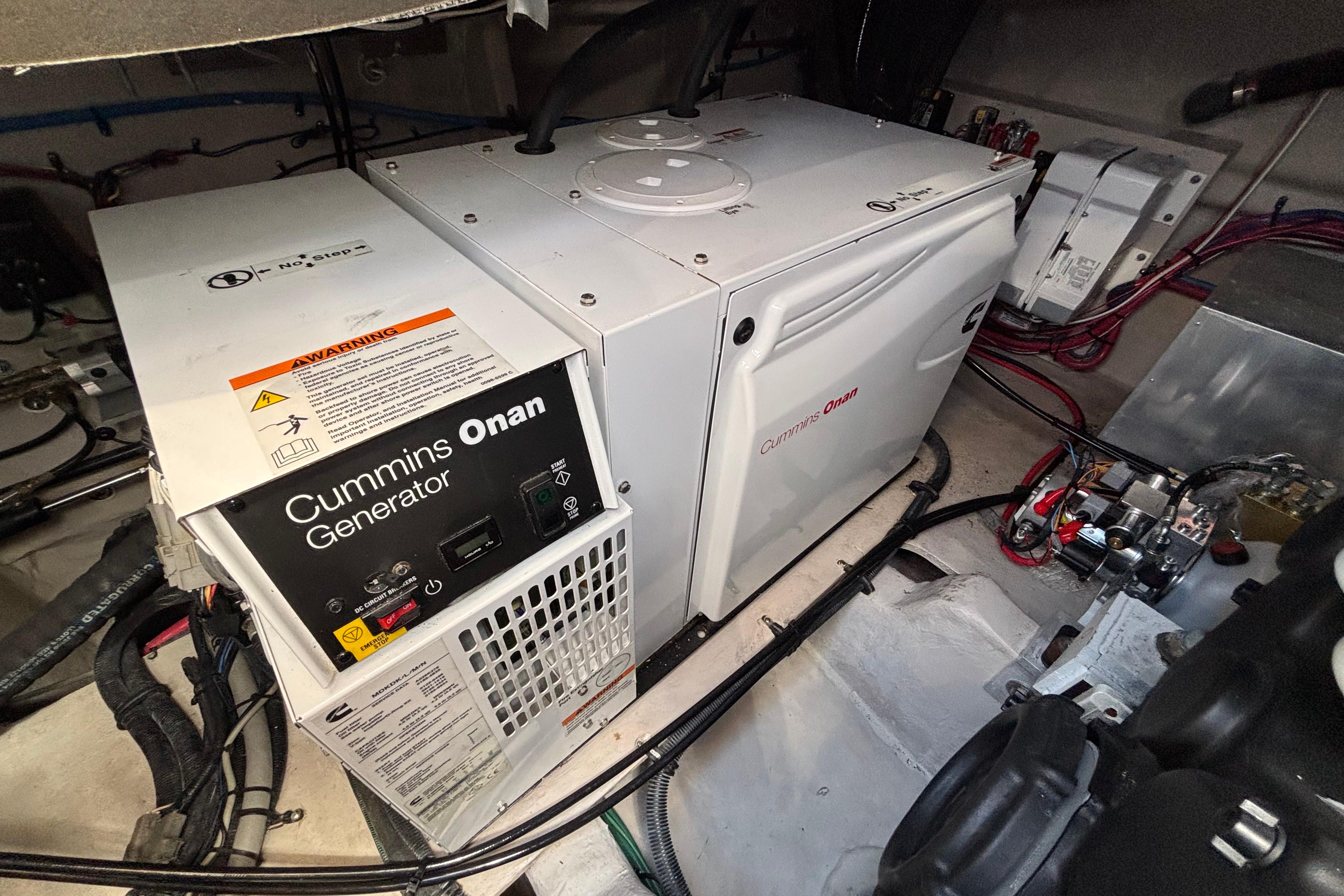 Cummins Onan generator in 2018 Sea Ray Sundancer 460 engine room.