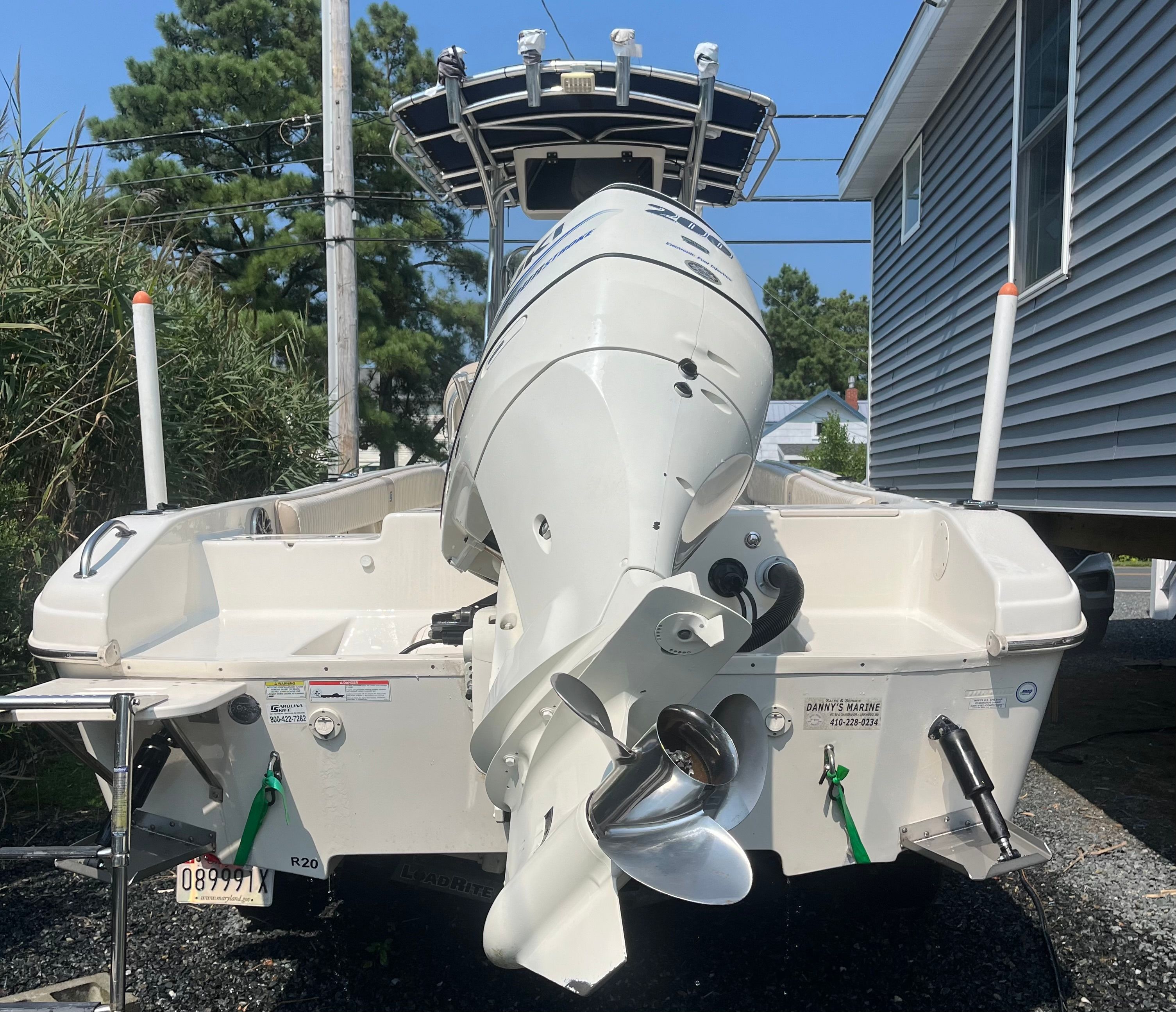 2014 Carolina Skiff 23 Ultra Elite boat with outboard motor.