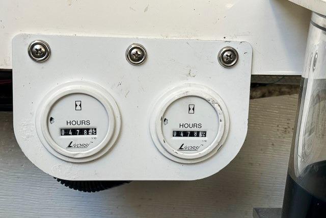Hour meters on a 2007 Fountain 38 Express Cruiser, showing 478.8 and 478.4 hours.