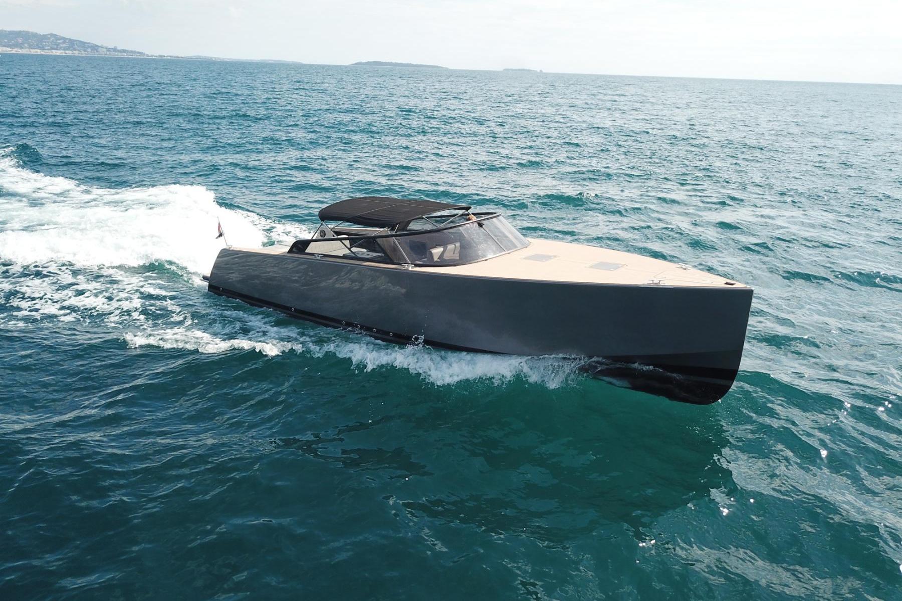 VanDutch 40 yacht cruising on open sea, 2010 model, sleek design.