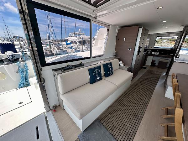 Modern interior of 2021 Bali 4.8 yacht with marina view.