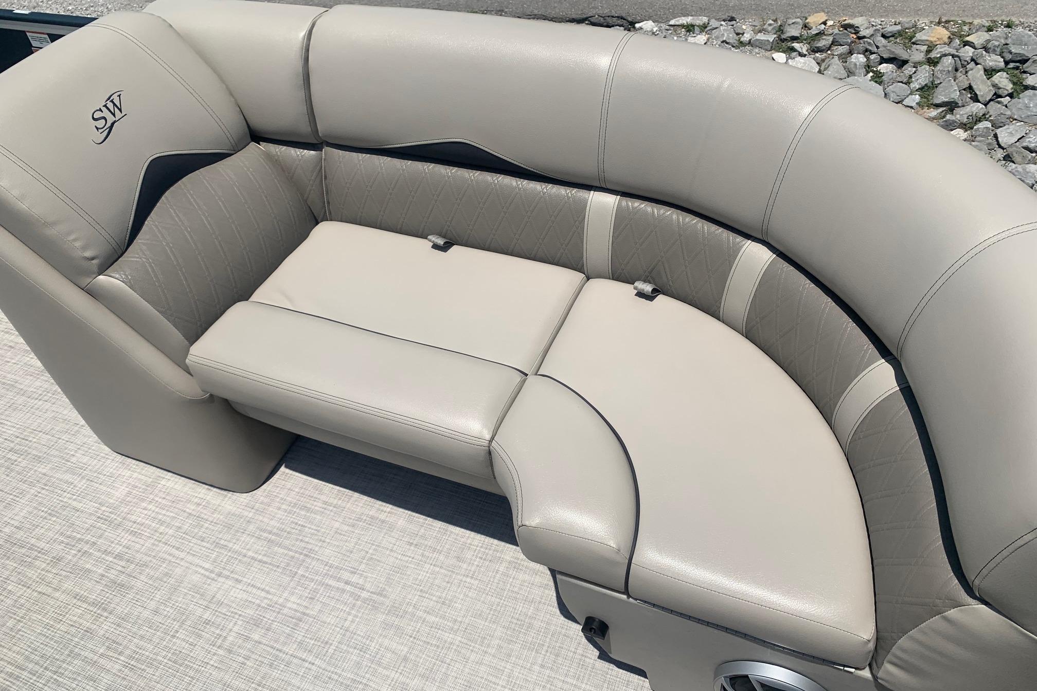 2023 Silver Wave 2410 SW3 CLS boat seating with elegant beige upholstery.