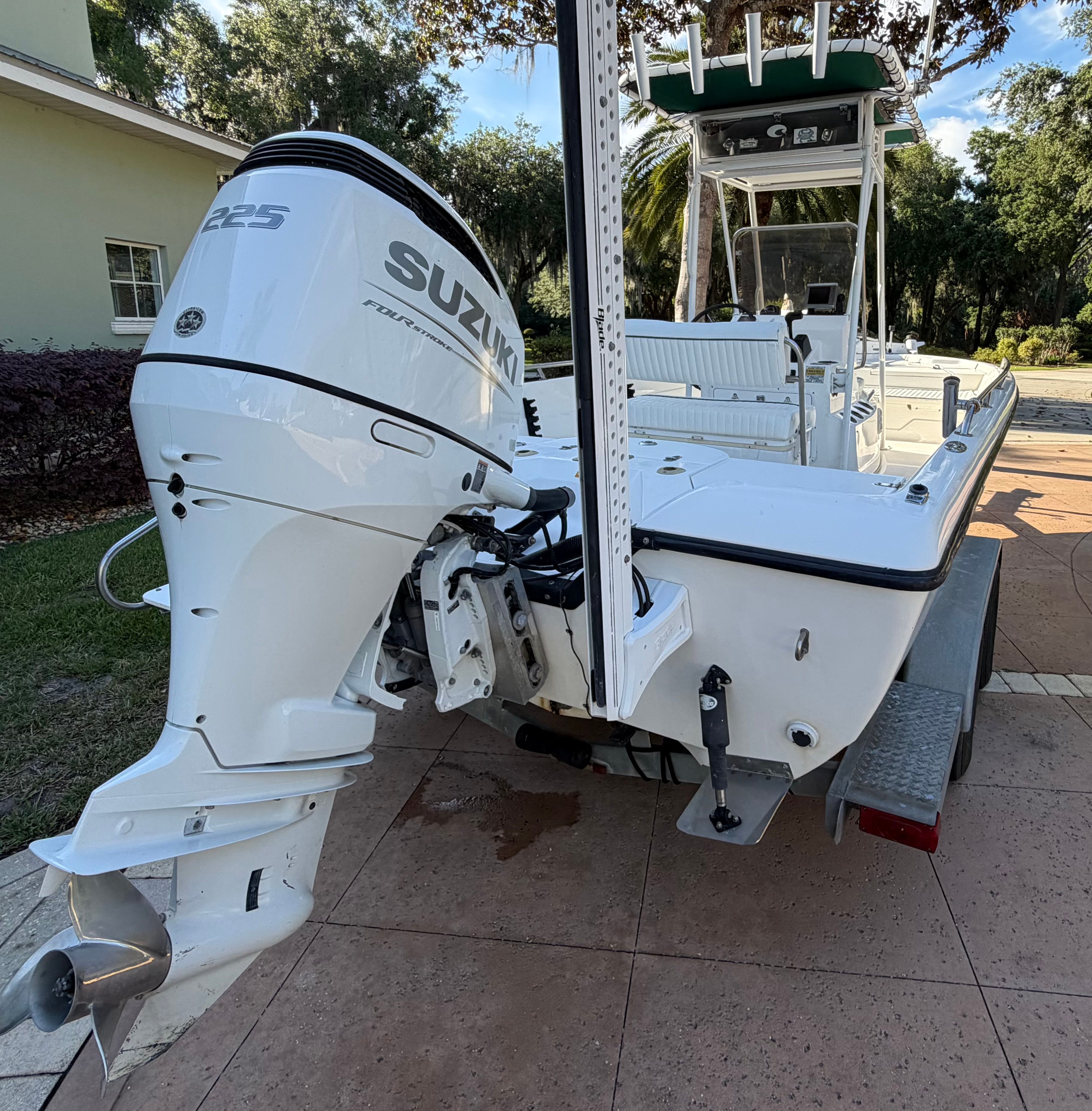 1999 Skeeter ZX2200 boat with Suzuki 225 outboard motor.