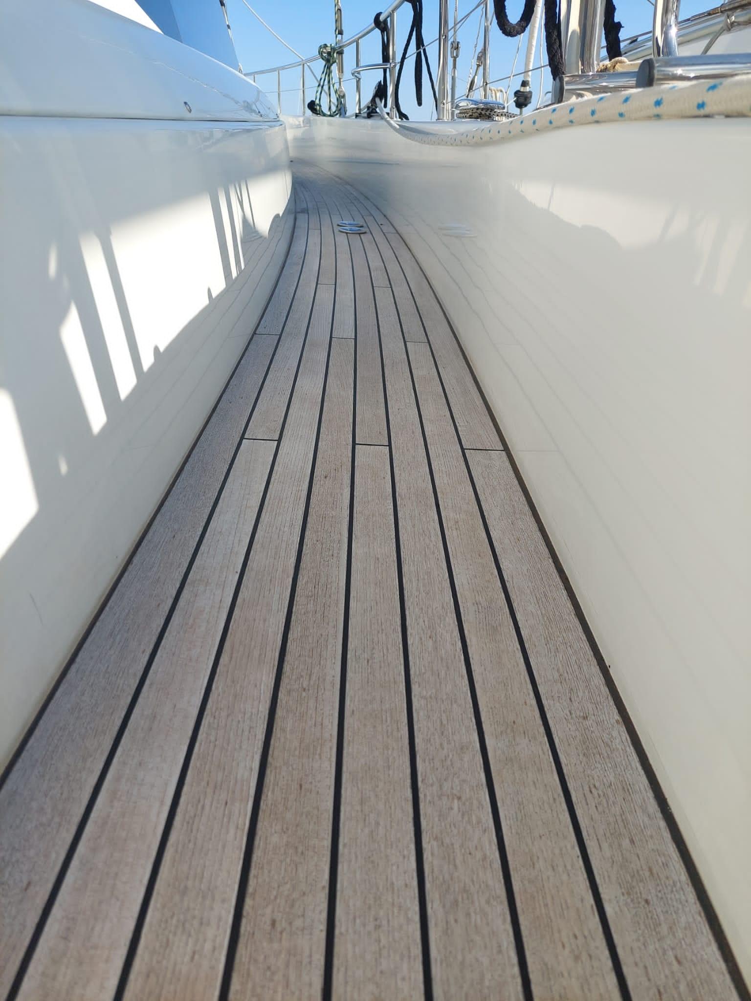 Teak deck of 2016 Moody 54 DS yacht, showcasing sleek design and craftsmanship.