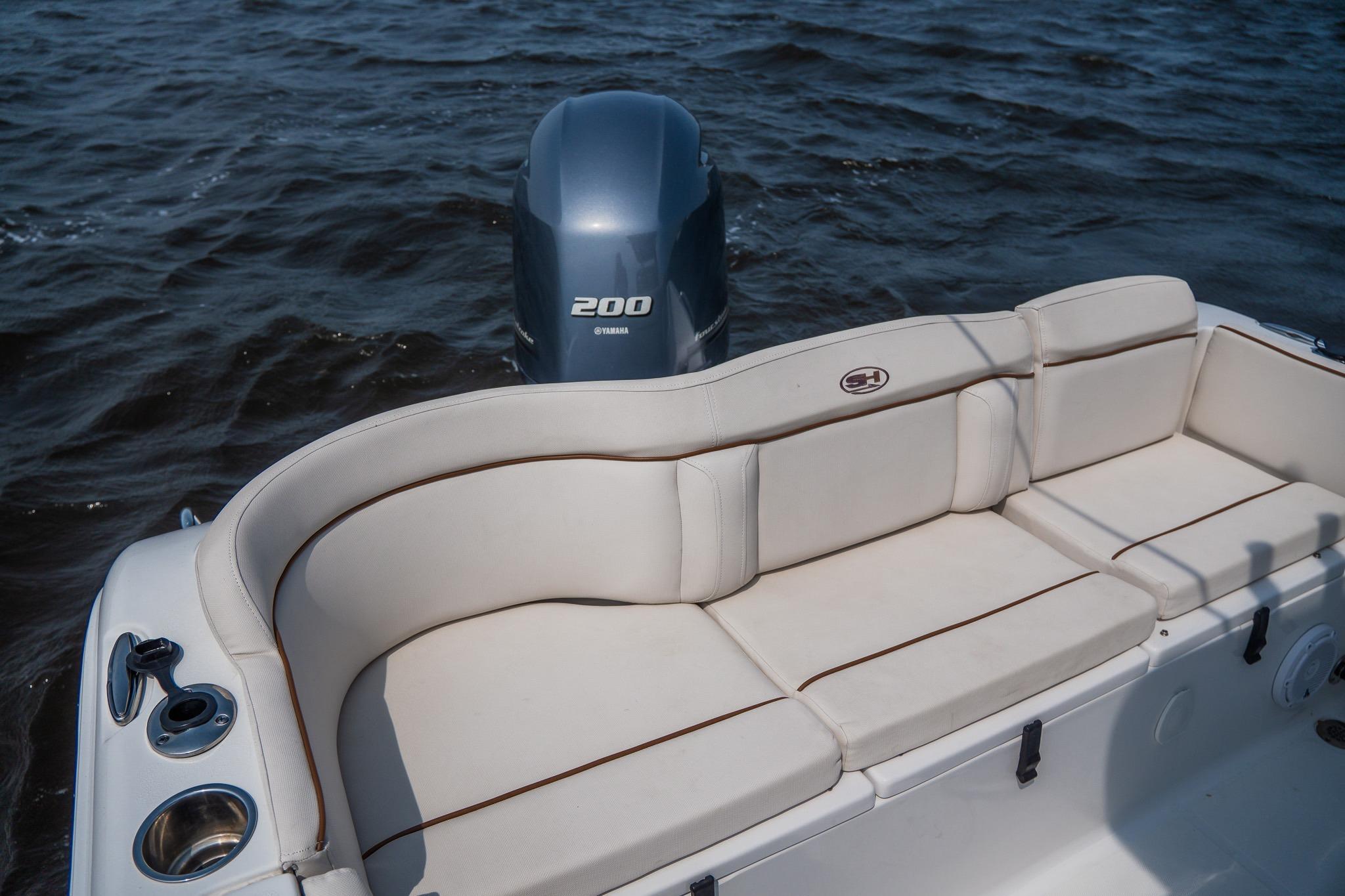 2022 Sea Hunt Ultra 229 boat with Yamaha 200 engine and comfortable seating.