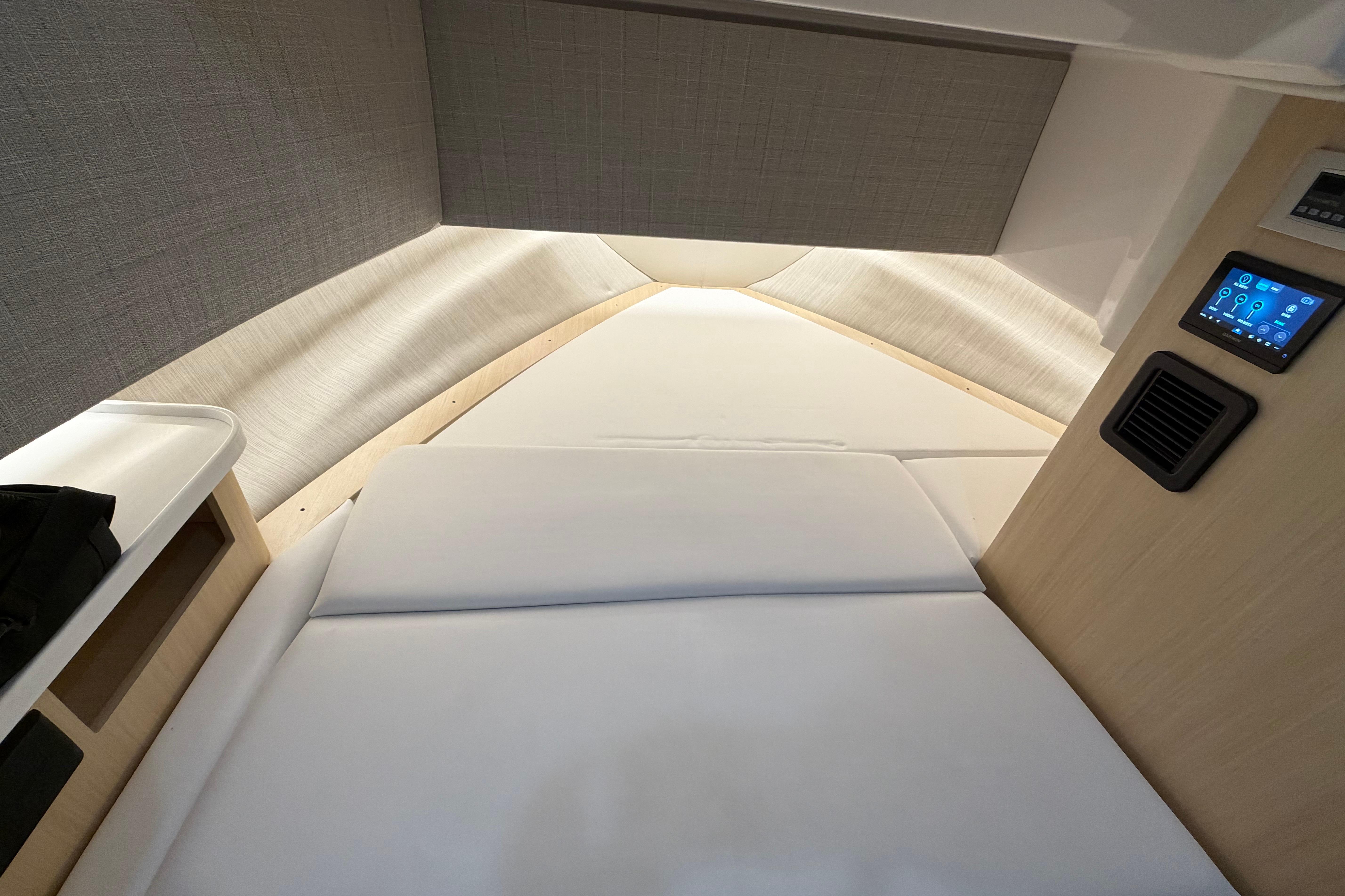 Interior cabin of 2027 Regal 38 Surf boat with modern design and control panel.