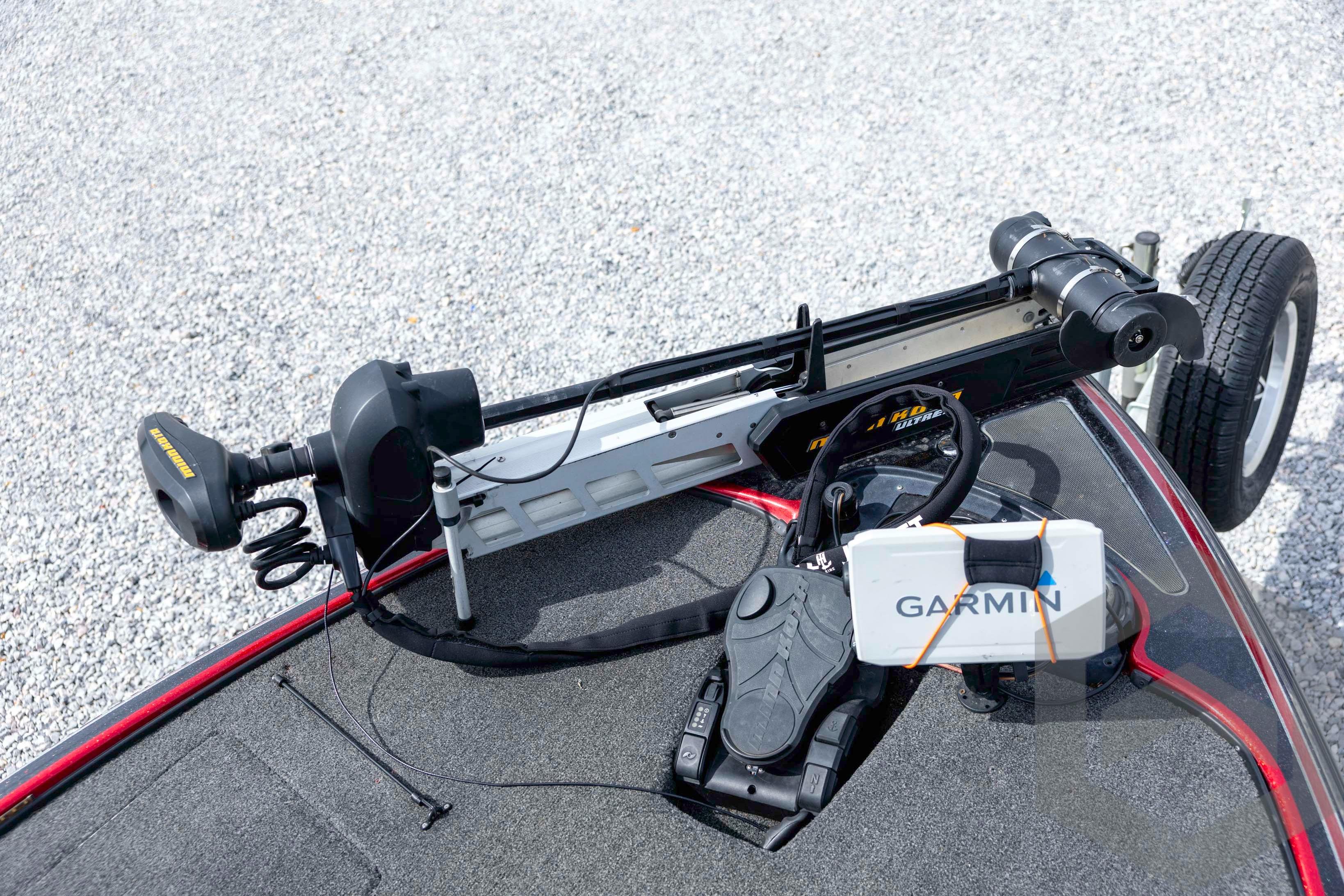 2013 Nitro Z-7 boat with Garmin equipment and trolling motor on gravel surface.