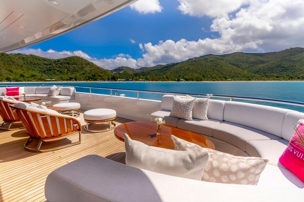 Luxurious yacht deck with elegant seating, scenic ocean view, Abeking & Rasmussen Custom 2009.