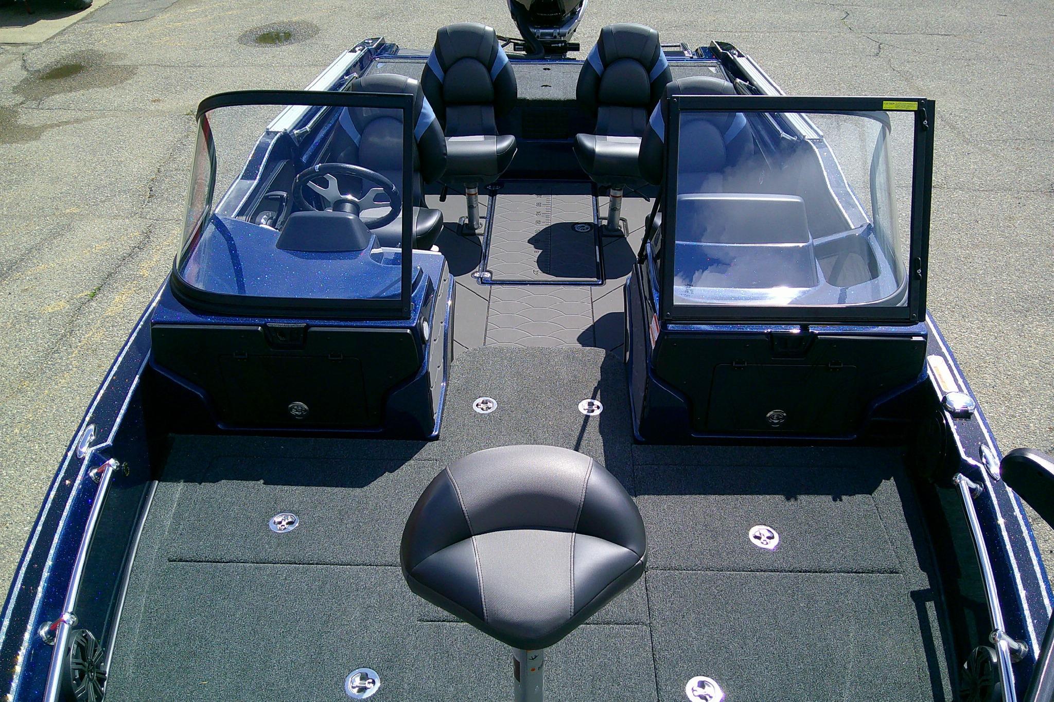 2025 Nitro ZV20 Sport boat interior with seating and steering console.