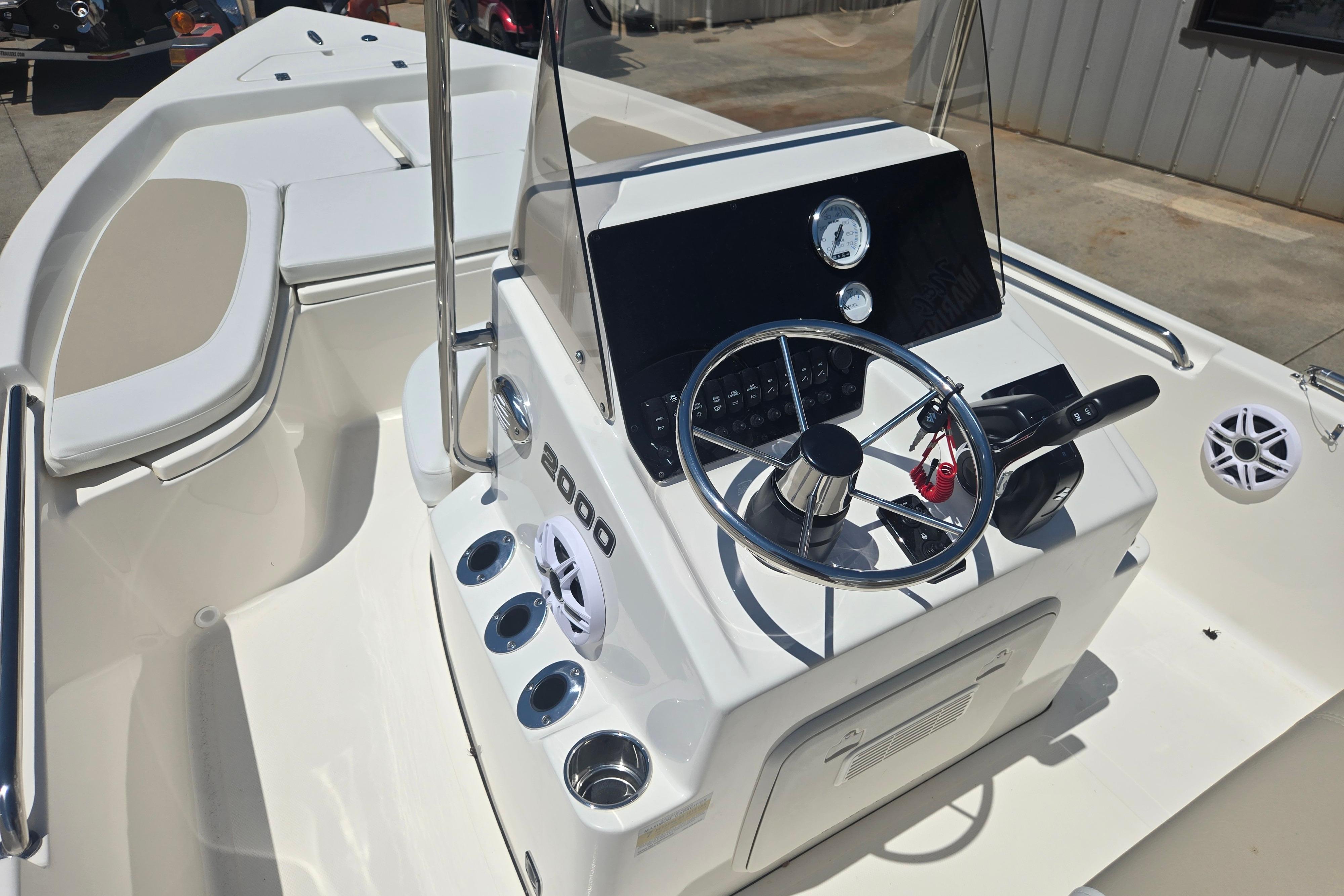2026 Bulls Bay 2000 boat interior with steering wheel and control panel.