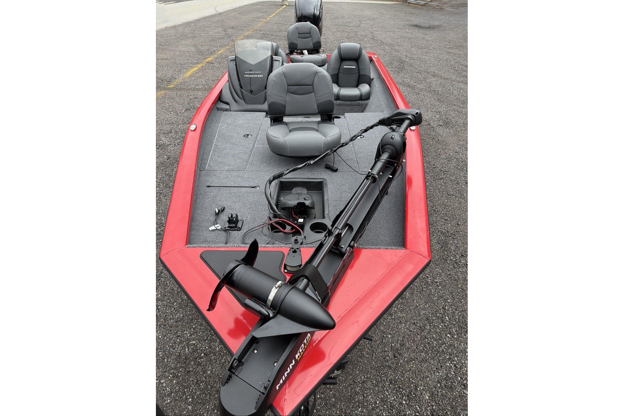 2026 Tracker Pro Team 175 boat with red exterior and gray seating.