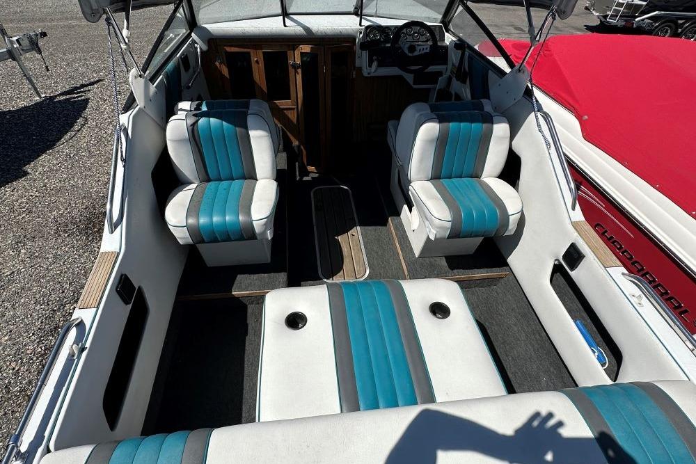 Interior of a 1992 Reinell 192 RM boat with blue and white seating.