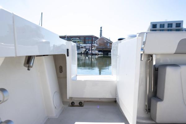 Manufacturer Provided Image: 2021 Parker 2520 XLD Sport Cabin boat interior with marina view.