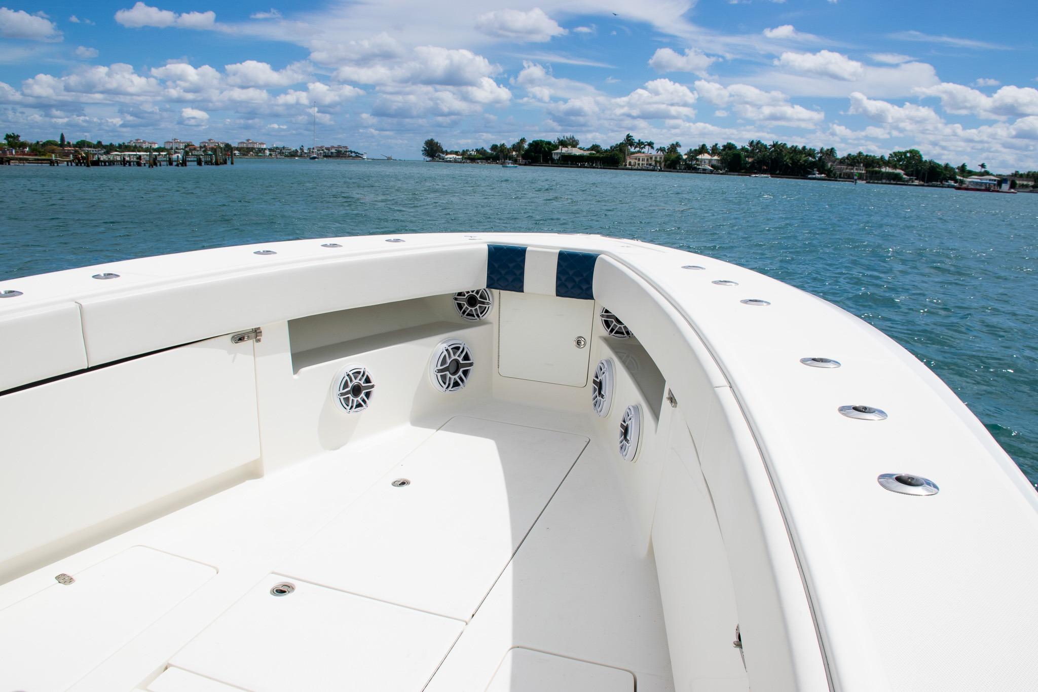 2022 SeaVee 390Z boat deck with ocean view and clear blue sky.