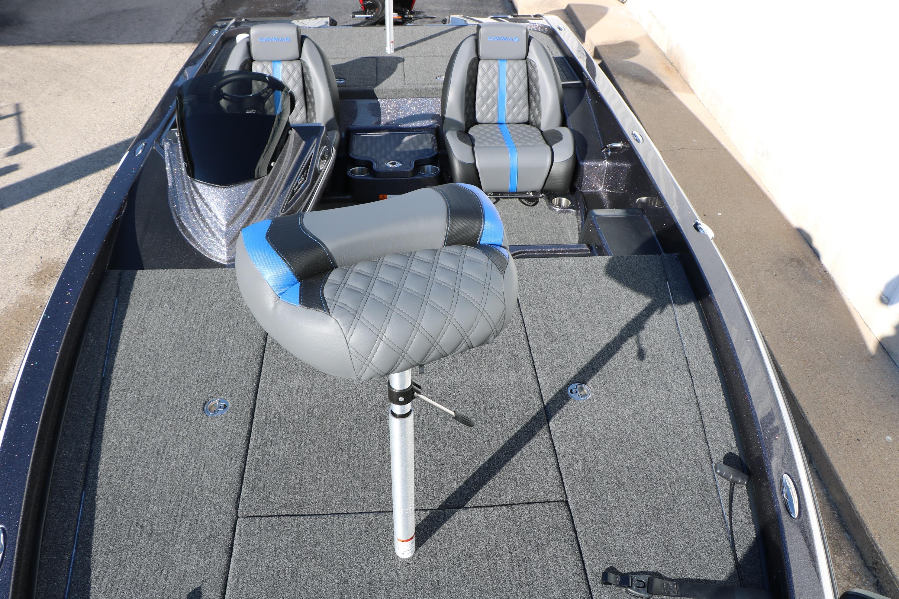 2027 Caymas 201 Pro boat interior with gray and blue seating and spacious deck.
