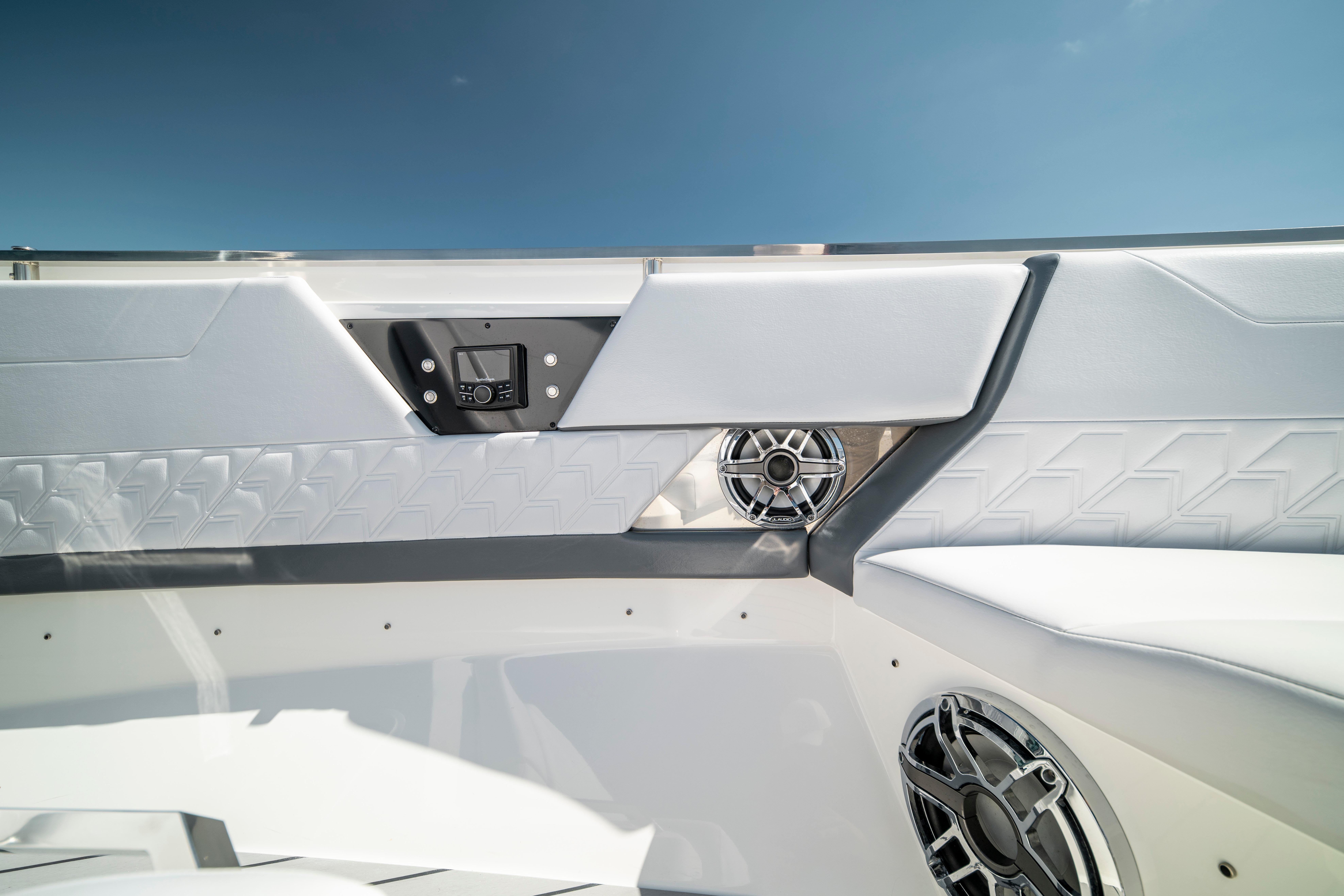 Interior of 2022 Formula 500 Super Sport Crossover boat with speakers and control panel.