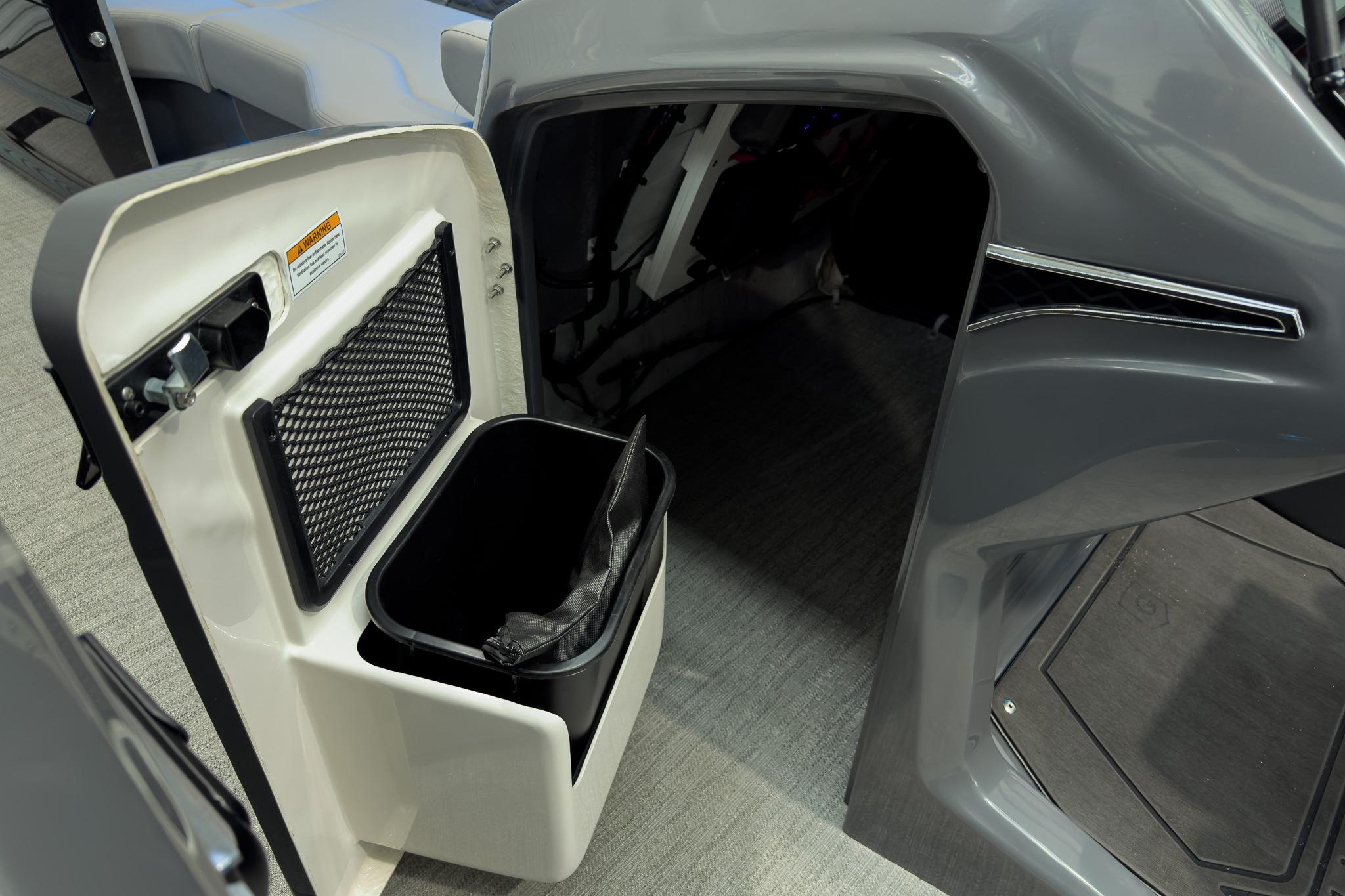 Interior storage compartment of 2026 Godfrey Sanpan 27' Tritoon boat.