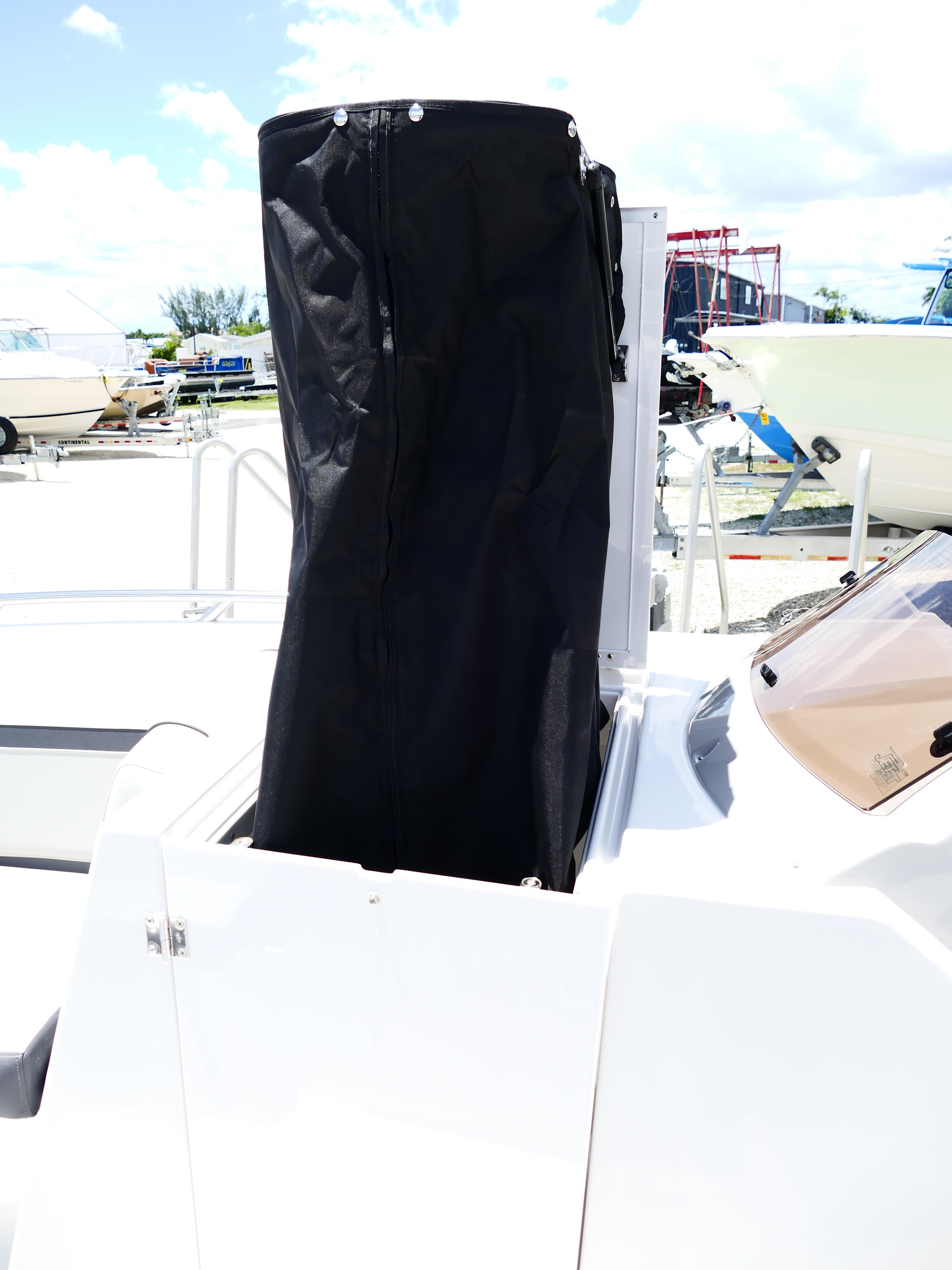 2026 Starcraft SVX 231 OB DH boat with black cover on deck.